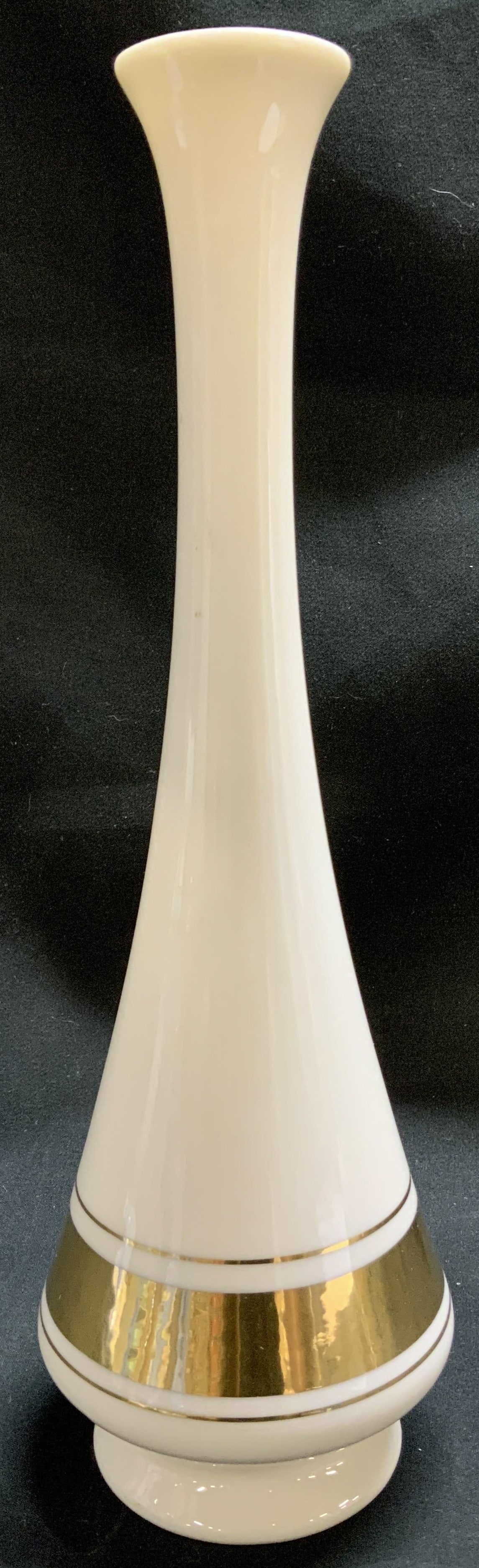 Lenox Minaret Porcelain Gilt Vase 10in USA: Lenox porcelain vase features a tall, slender design. Gilt accents & glossy finish. Signed & marked on underside. Reads, LENOX. MADE IN USA. Surface wear consistent to age, use & exposure. Measurement