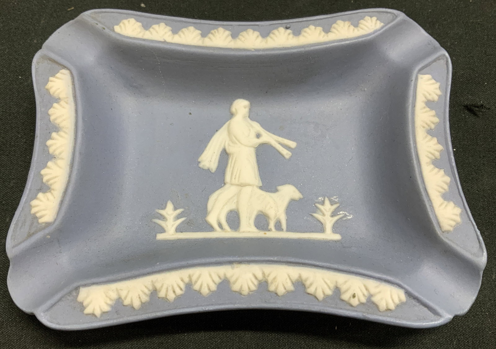 Vtg Classical Relief Ashtray OCCUPIED JAPAN: Vintage matte blue ashtray features a classical white relief figure & leaf decorative border. Signed & marked on underside. Reads, MADE IN OCCUPIED JAPAN. Surface wear consistent to age, use & exposur