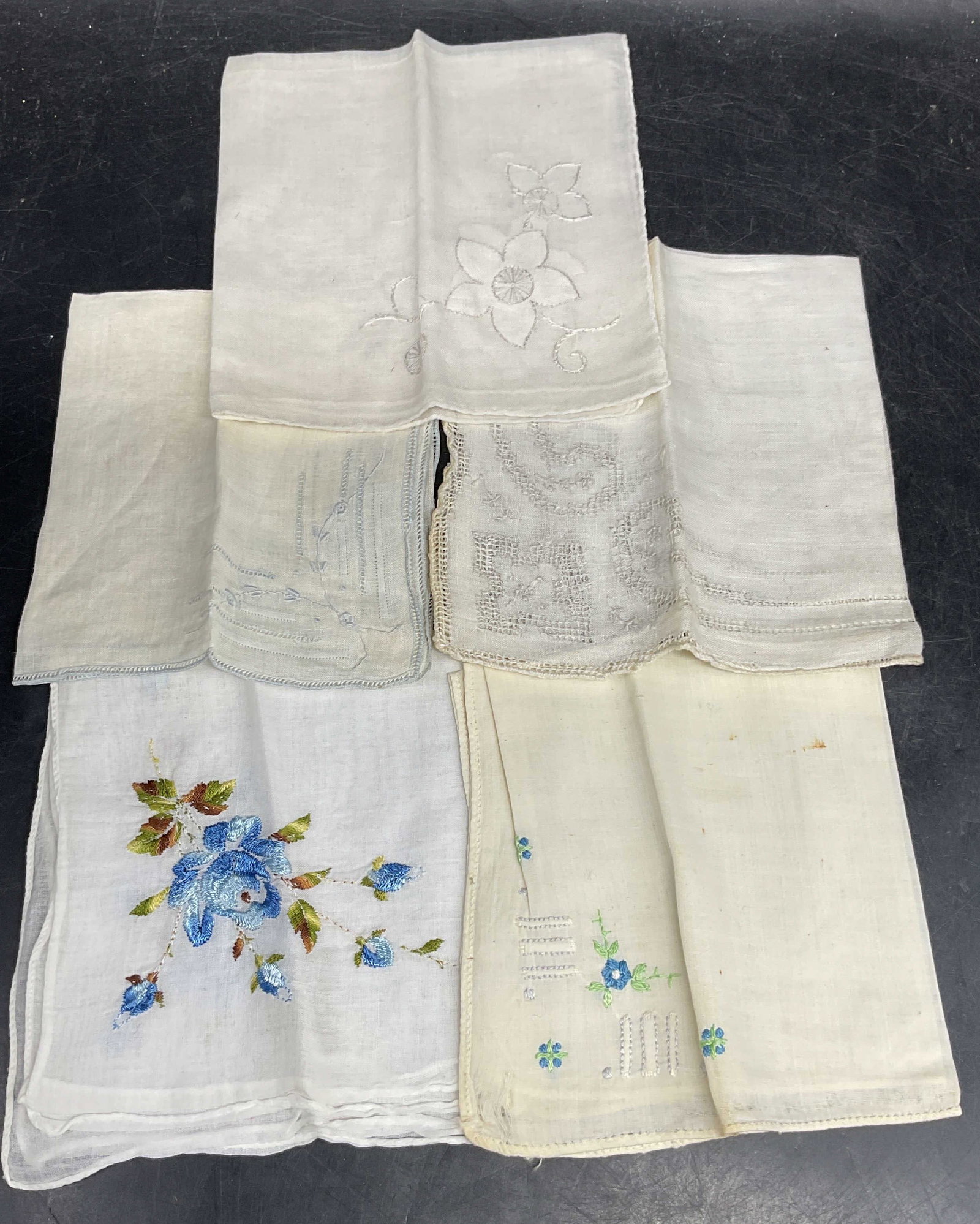 Lot 5 Vtg White Blue Floral Cotton Handkerchiefs: Lot of 5 white and blue embroidered floral cotton handkerchiefs. Largest measures approx. 11 x 11.5 inches. Some blemishes and tearing. Handkerchief, Vintage handkerchief, collectible handkerchief, ac