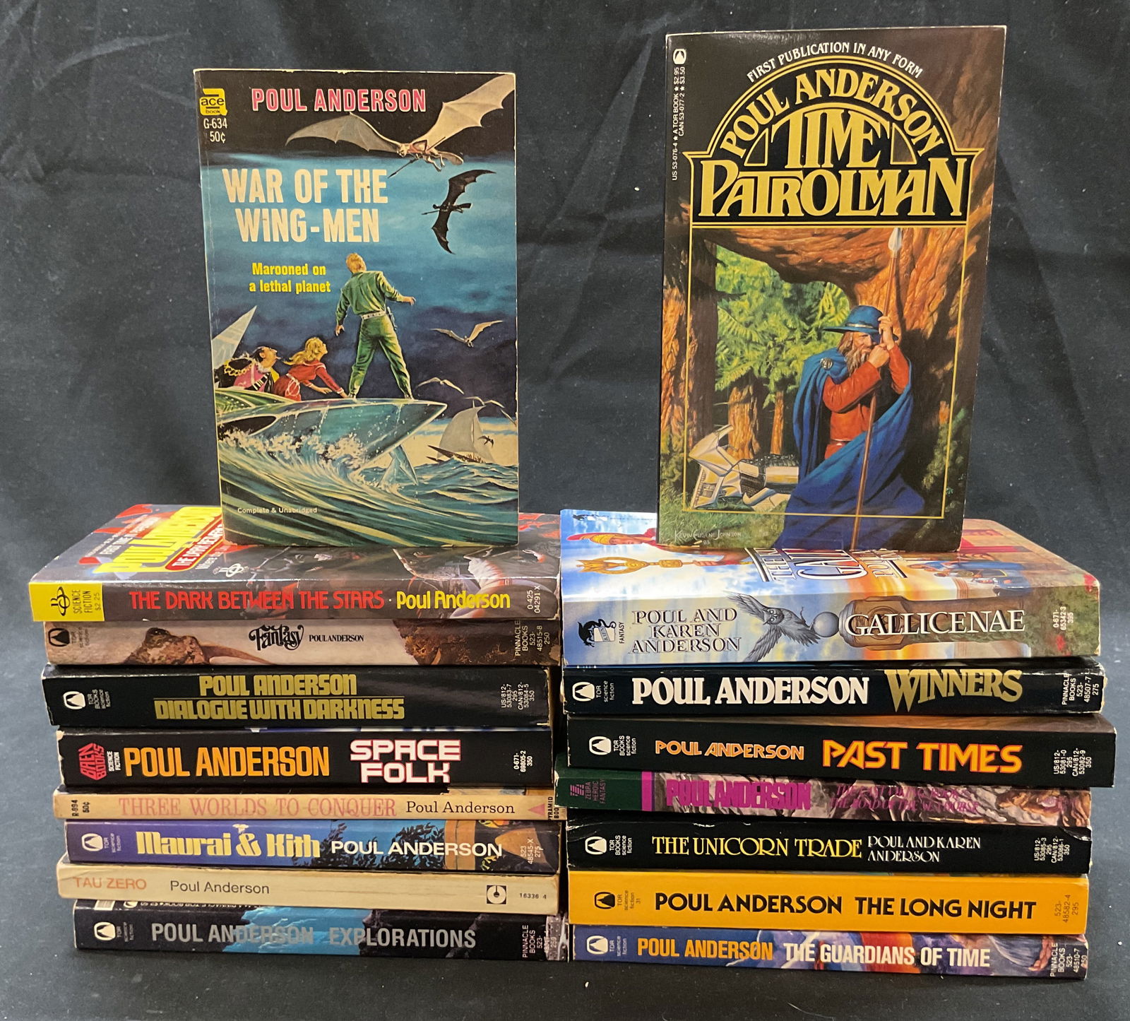Grp Lot 17 Poul Anderson Sci Fi Bks 1950s-90s: Group lot of 17 books. Science fiction books by Poul Anderson. Ranging from 1950s to 1990s. Titles vary. Soft cover books with illustrated covers. Measures approx 4.5 x 7 inches. Surface wear consiste