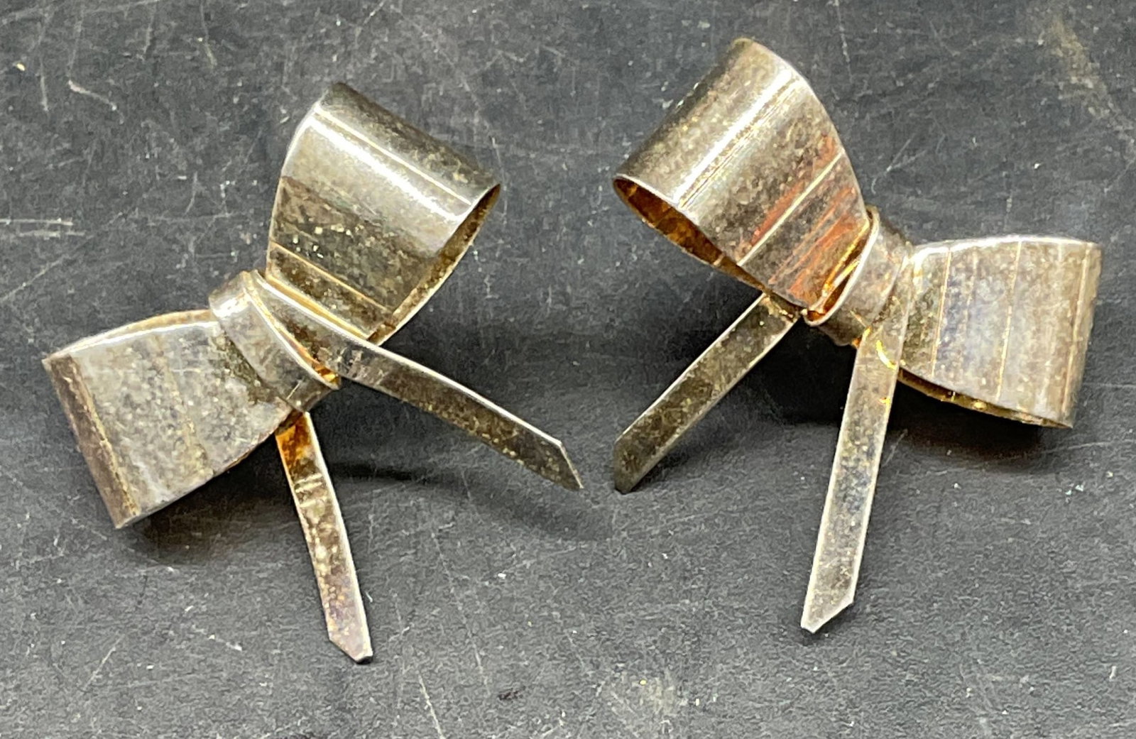 Sterling Silver Bow Earrings, Italy: Sterling silver bow motif earrings. Made in Italy. Measures approx. 1 x 1 inches. Marked sterling. Total weight 5.9 grams. Some scratching. Jewelry, estate jewelry, fine jewelry, cocktail jewelry, fas