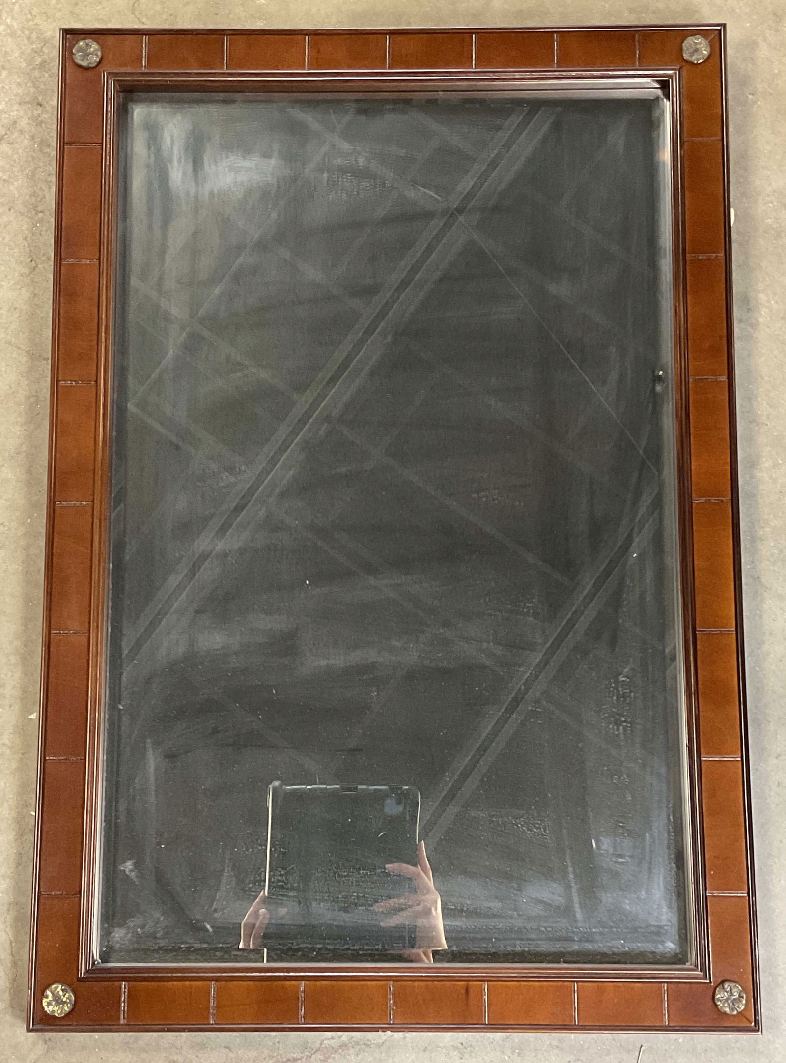 Bombay Company Mahogany Brass Medallion Mirror 31i: Vintage Bombay Company mahogany wall mirror with brass medallion corners. Measures approx. 31.5 x 21.75 inches. Some scratching. Bombay company mirror, wood mirror, brass mirror, medallion mirror, wal