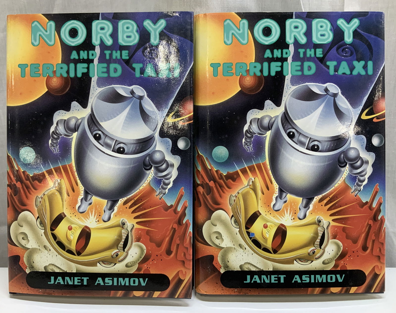 Lot 2 1977 Norby & Terrified Taxi 1st Ed Bk ASIMOV: Norby & The Terrified Taxi by Janet Asimov. Walker & Company New York. Copyright 1997. First edition published by Walker Publishing Company. Printed in the USA. Front cover features illustrations. Sur