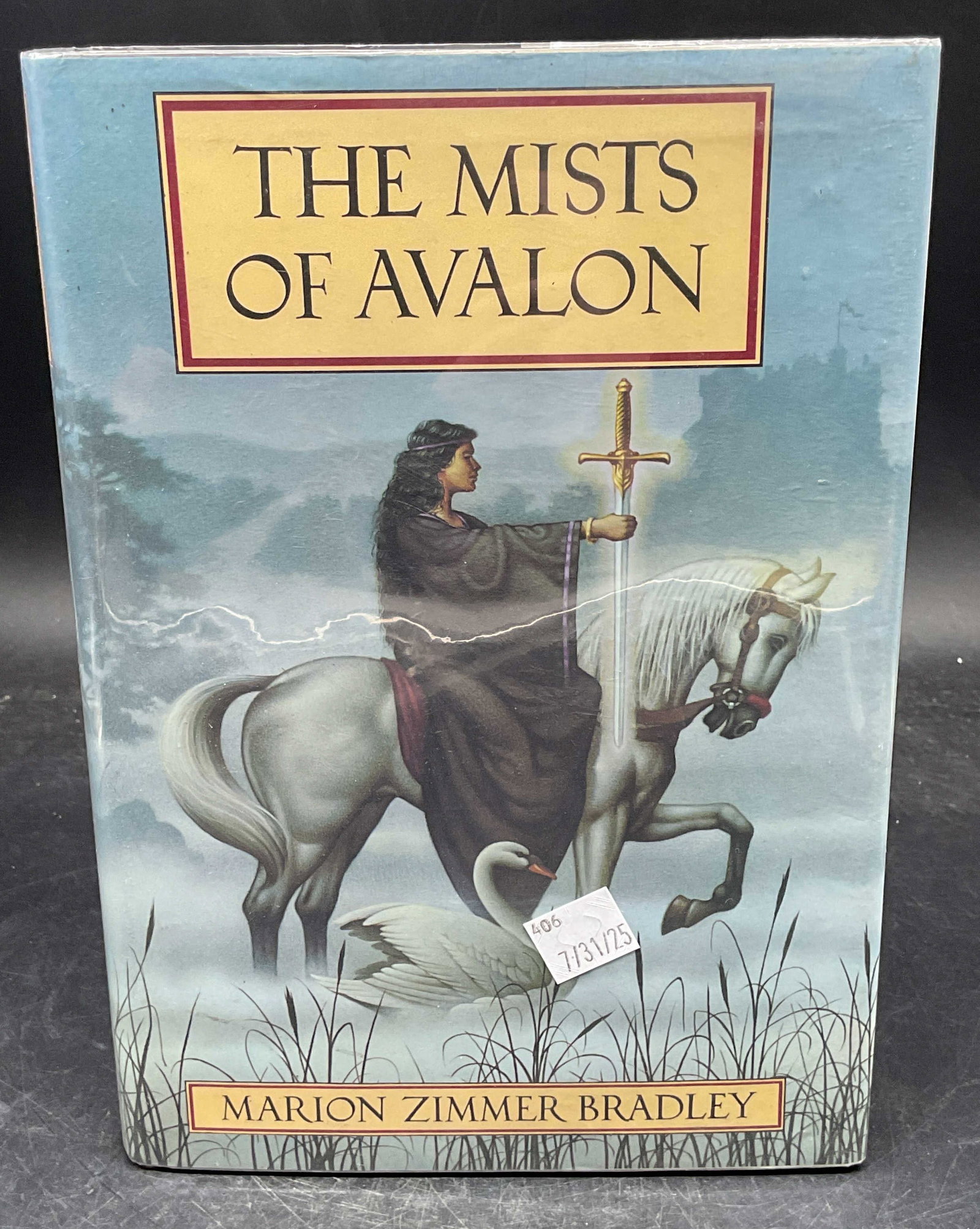 Bradley The Mists of Avalon 1st Ed 1982: Hardcover first edition The Mists of Avalon by Marion Zimmer Bradley. Knopf, 1982. Measures approx. 9.5 x 6.75 inches. Some wear to cover, pages, and binding consistent with exposure. Book, vintage bo