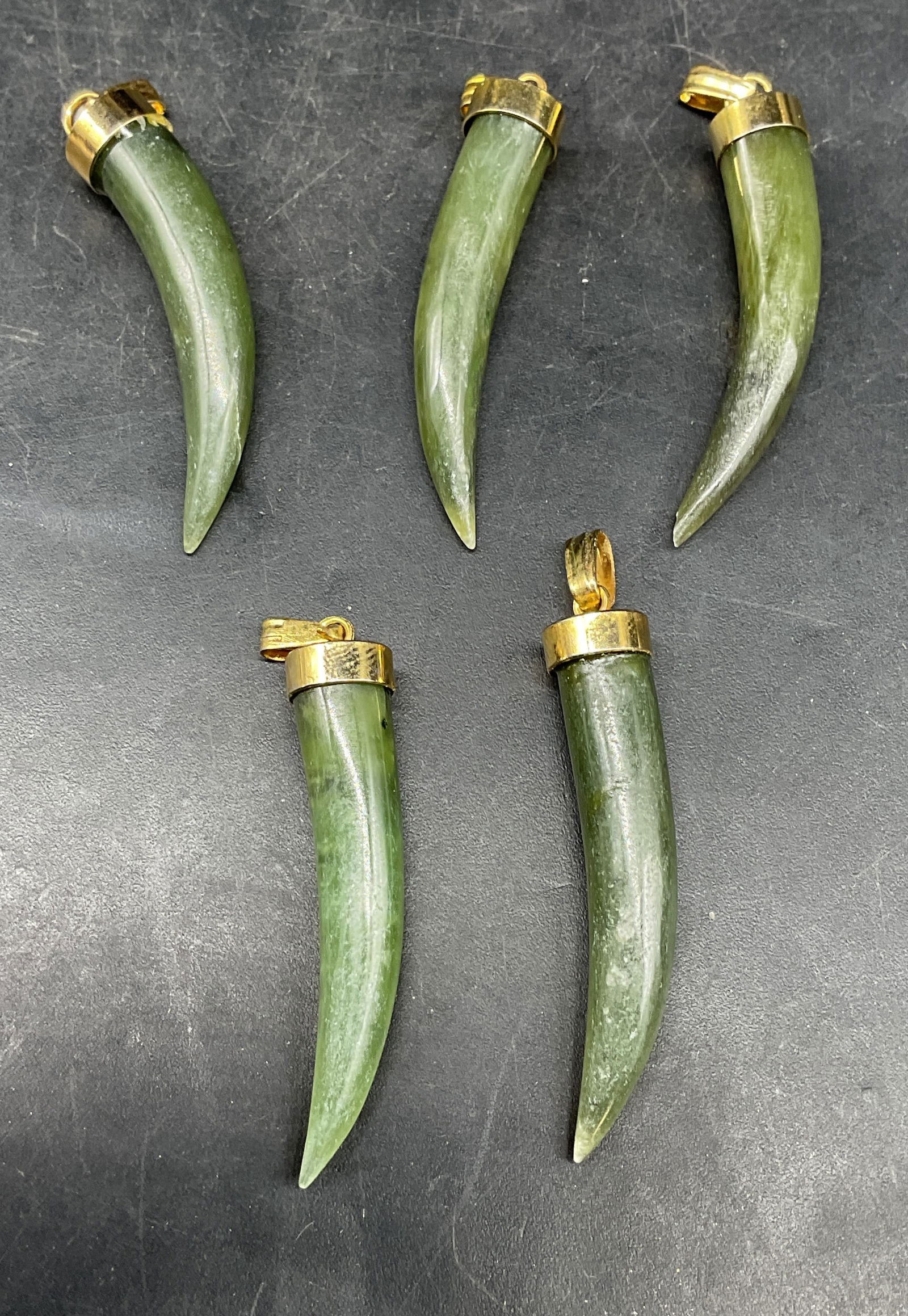 Lot 5 Vtg Gold Tone Nephrite Jade Pendants: Lot of 5 Vintage nephrite jade pendants with gold tone accents. Measures approx. 1.5 inches long. Some scratching. Jewelry, estate jewelry, costume jewelry, cocktail jewelry, fashion jewelry, accessor