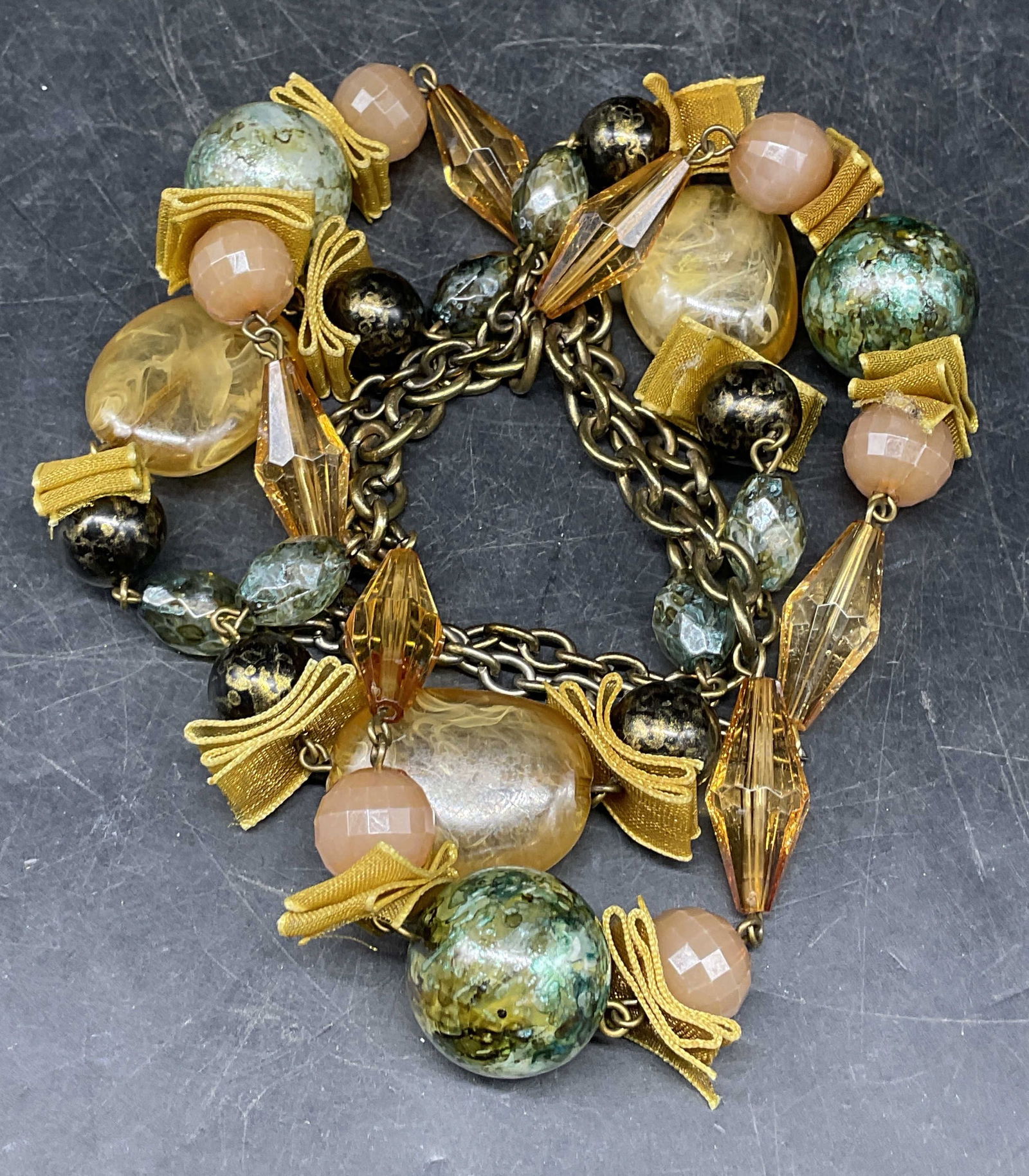 Vtg Gold Tone Faux Crystal Stone Necklace: Vintage gold tone faux lucite crystal and stone beaded necklace. Drop length approx 20 inches. Some scratching. Jewelry, estate jewelry, costume jewelry, cocktail jewelry, fashion jewelry, accessories