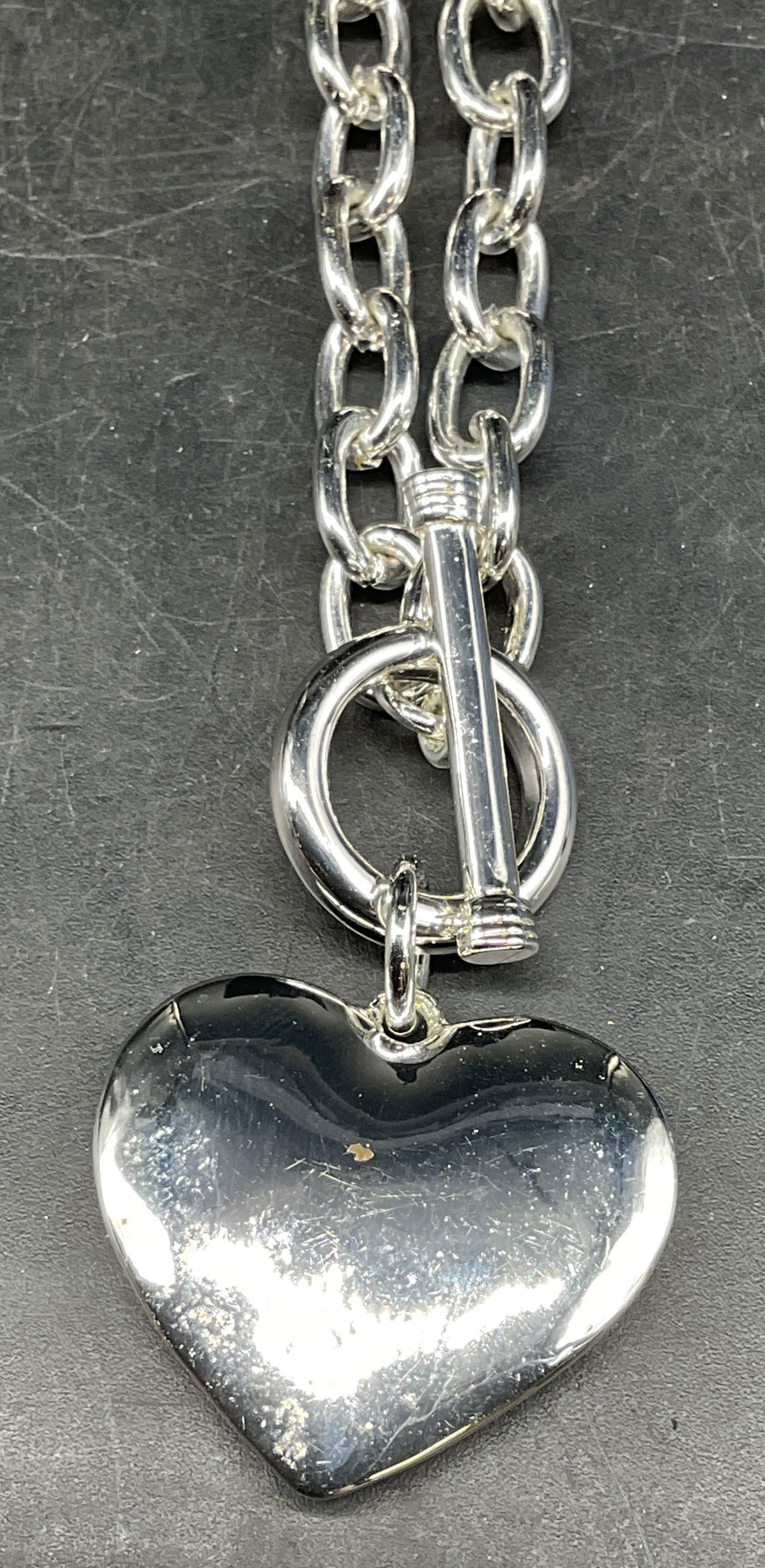Silver Tone Chain Heart Pendant Necklace: Silver tone chain necklace with heart pendant. Drop length approx 8.25 inches. Some scratching. Jewelry, estate jewelry, costume jewelry, cocktail jewelry, fashion jewelry, accessories, fashion access