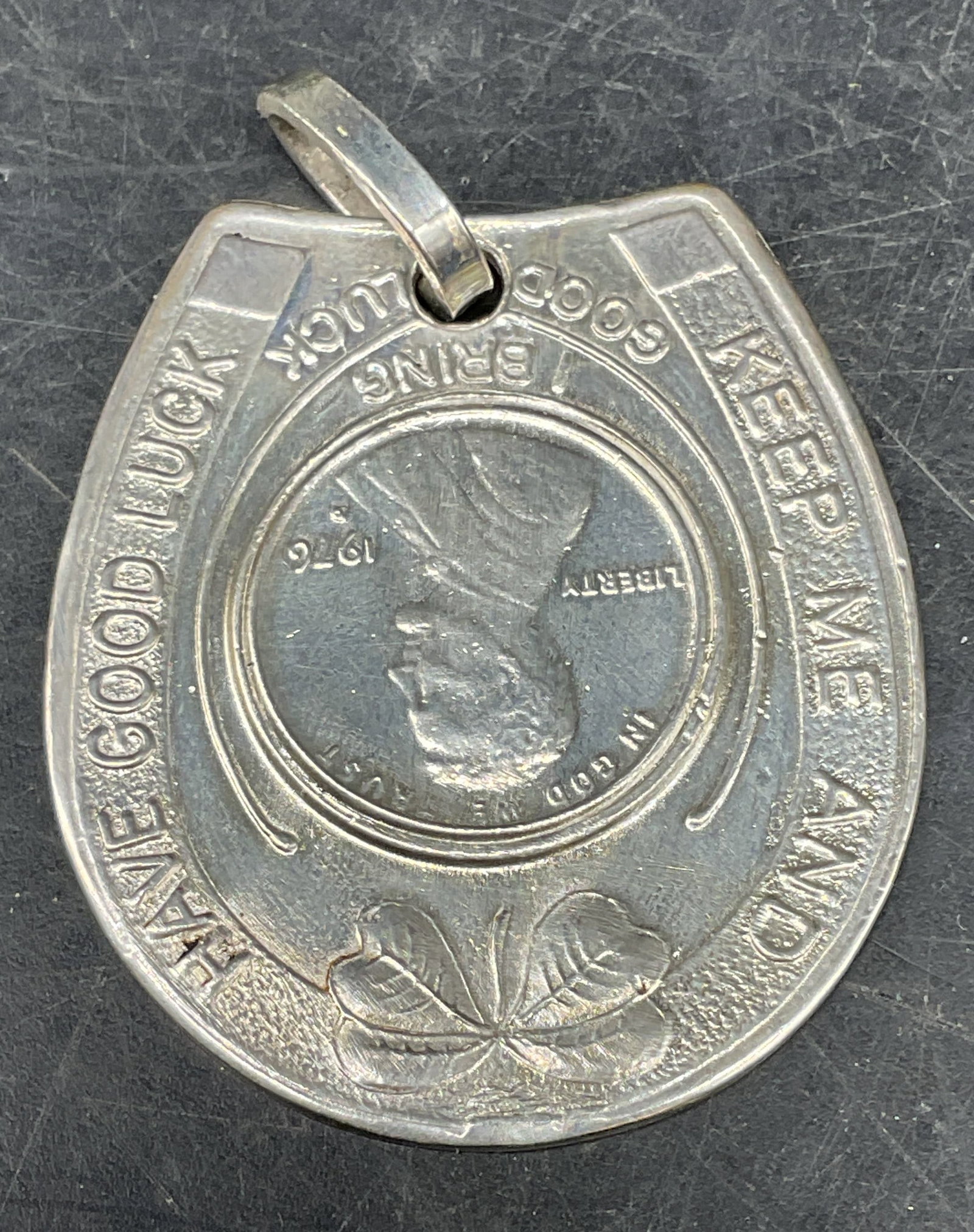 Silver Tone Good Luck Penny Pendant: Silver tone good luck Penny and horseshoe motif pendant. Measures approx. 1.5 x 1.25 inches. Some scratching. Jewelry, estate jewelry, costume jewelry, cocktail jewelry, fashion jewelry, accessories,