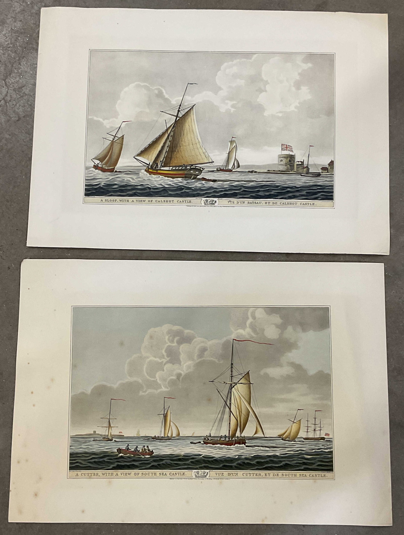 Lot 2 Maritime Scene Aquatint Prints 23in: Lot of 2 historical reproduction maritime scene aquatint prints. Ships on water. A Cutter With A View of South Sea Castle and A Sloop With A View of Calshot Castle. Measures approx. 16 x 23 inches. We