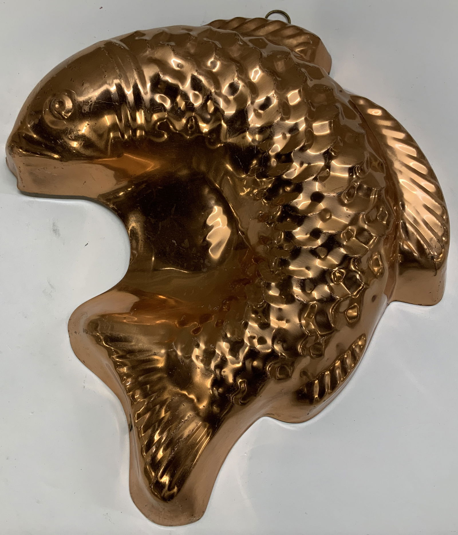 Vtg ODI Solid Copper Fish Mold PORTUGAL: Vintage solid copper mold depicting a fish with textured scales. Comes with hook. Signed & marked. Reads, ODI MADE IN PORTUGAL. SOLID COPPER. Surface wear consistent to age, use & exposure.