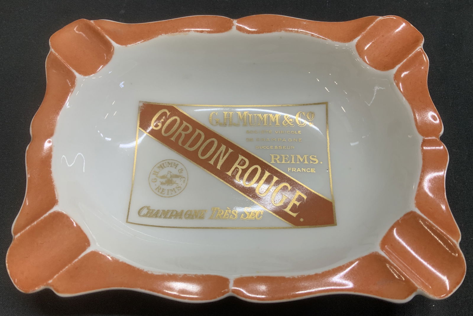 Vtg Haviland Limoges G.H.Mumm & Co. Porc Ashtray: Vintage Haviland Limoges advertising porcelain ashtray for G.H. Mumm & Co. Cordon Rouge champagne. Features gilt accents. Signed & marked on underside. Reads, HAVILAND FRANCE. LIMOGES. Surface
