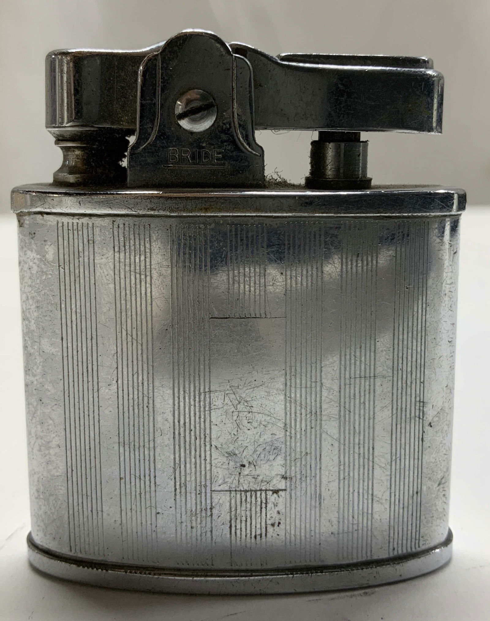 Vtg Bride Superative Standard Lighter JAPAN: Vintage standard lighter is silver toned & features a striped design. Pocket size. Surface wear consistent to age, use & exposure. Signed & marked. Reads, BRIDE SUPERATIVE AUTOMATIC STANDARD LIGHTER J