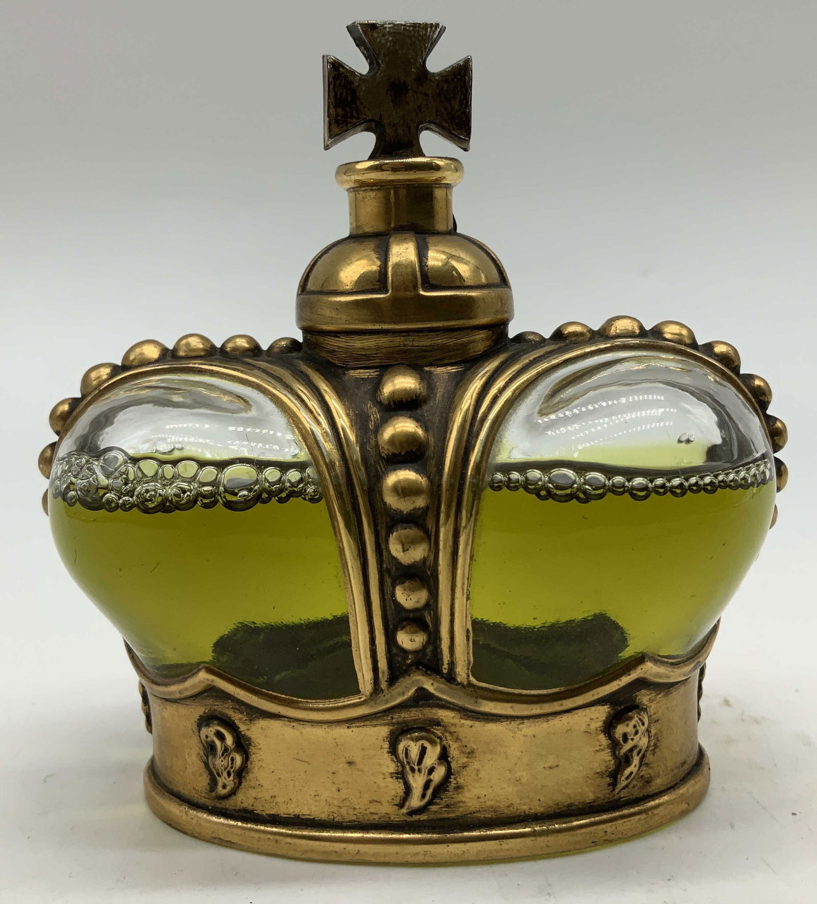 Vtg Prince Matchabelli Crown Perfume Bottle: Vintage Prince Matchabelli perfume bottle features a crown design with gilt accents & green glass. Finial at top. Signed & marked on underside. Reads, PRINCE MATCHABELLI. Surface wear consistent