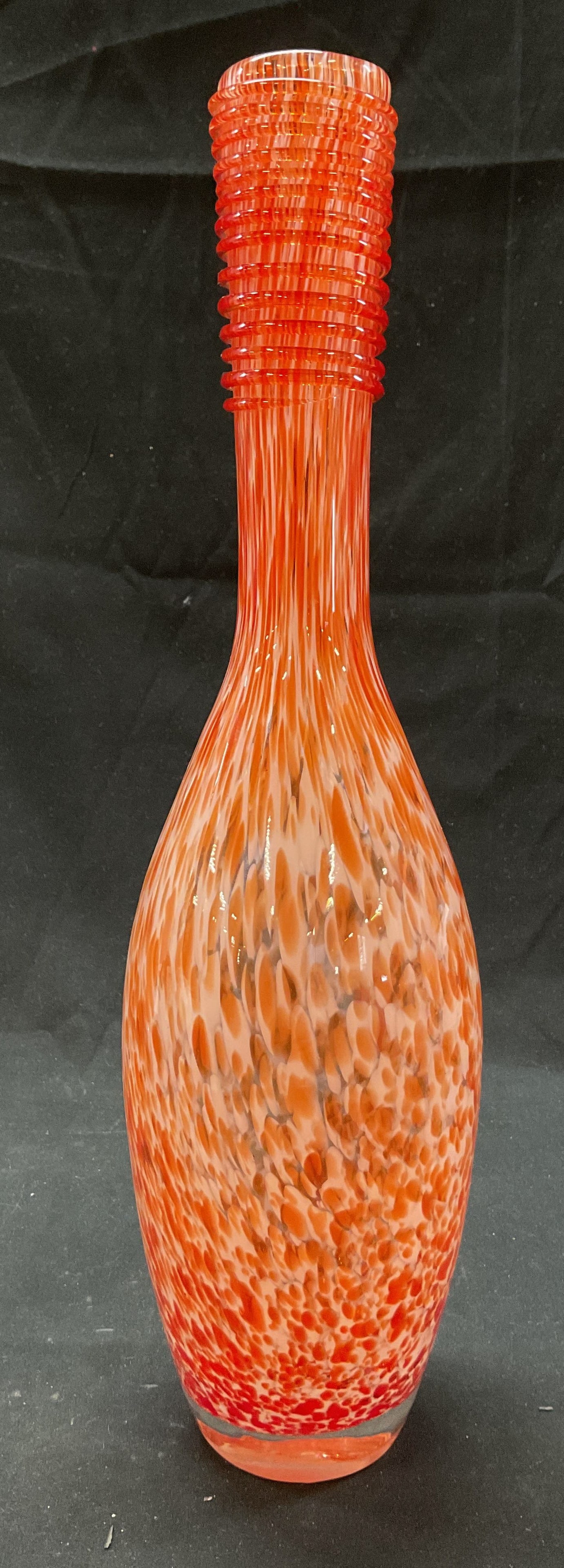Vtg Orange & White Art Glass Speckled Bud Vase: Vintage orange and white hand blown cased art glass speckled bud vase. Speckled confetti splatter pattern in orange and white. Elongated bowling pin shape. Ribbed contour surface on neck.