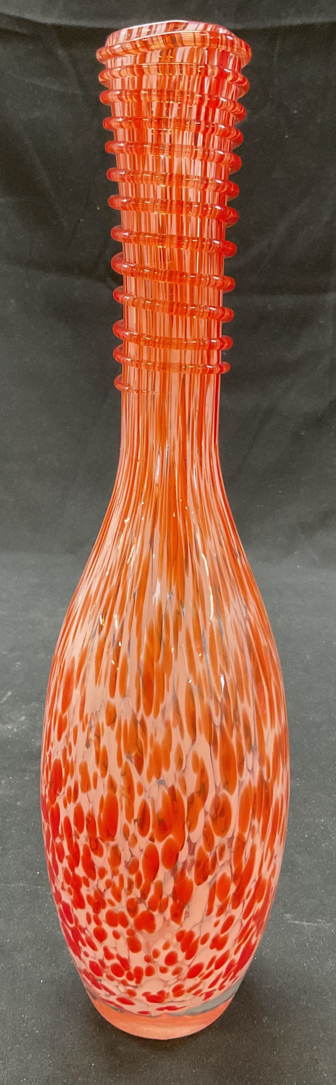 Vtg Orange & White Art Glass Speckled Bud Vase: Vintage orange and white hand blown cased art glass speckled bud vase. Speckled confetti splatter pattern in orange and white. Elongated bowling pin shape. Ribbed contour surface on neck.