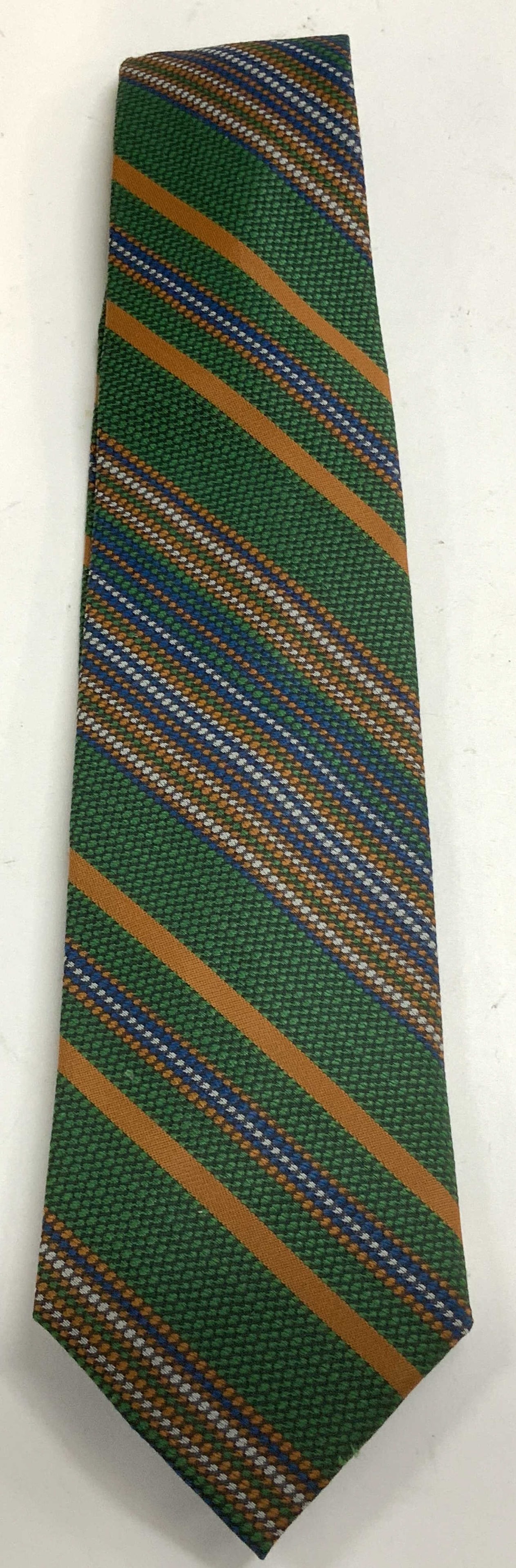 Vtg Botany Striped Necktie: Vintage Botany necktie featuring a green, orange, blue & white striped pattern. 100% polyester. Signed & marked. Reads, BOTANY. Surface wear consistent to age, use & exposure. Measurements: