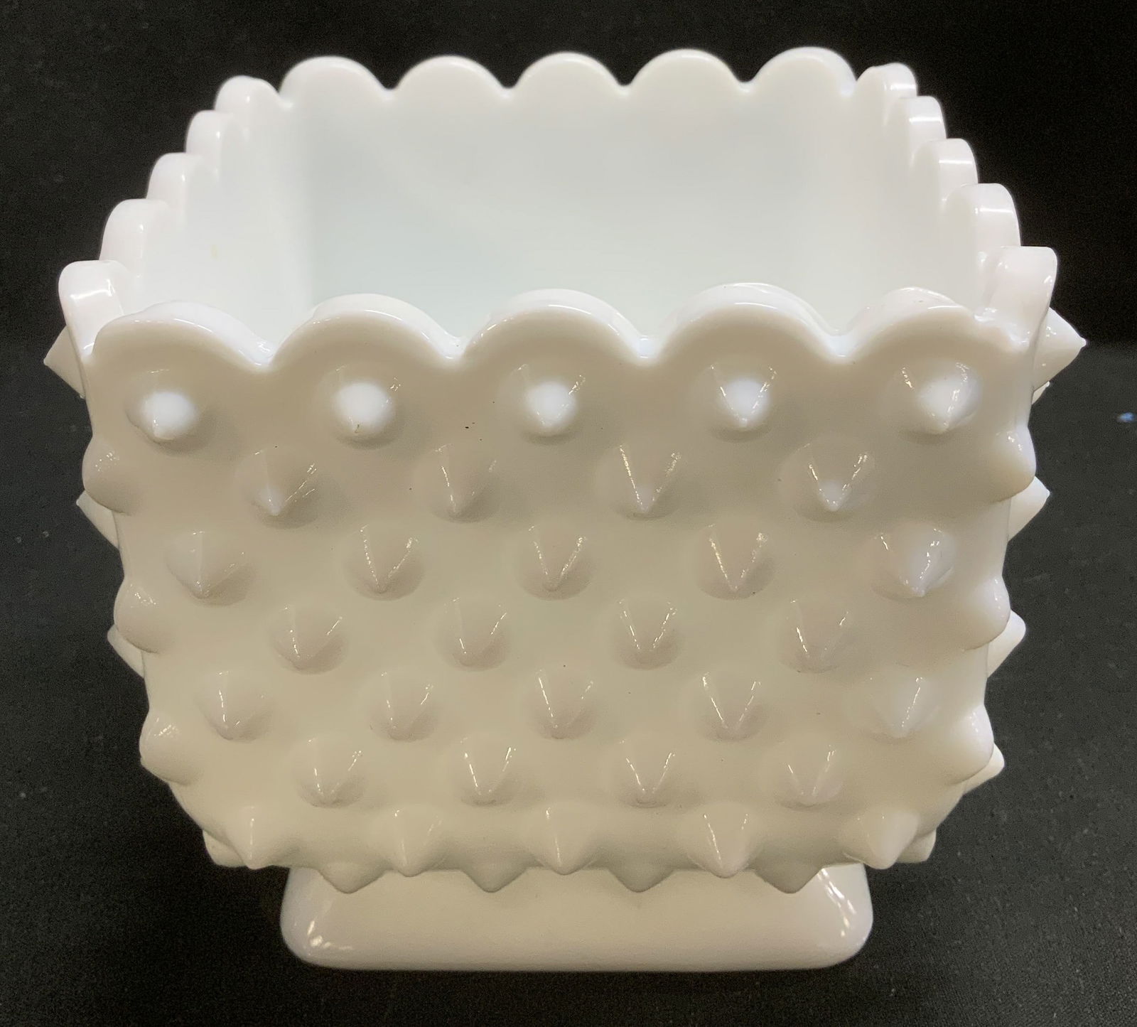 Vntg Milk Glass Hobnail Vessel: Vintage milk glass vessel features a raised hobnail pattern on body. Scalloped top & square shape. No visible signature or markings. Surface wear consistent to age, use & exposure. Measurements: