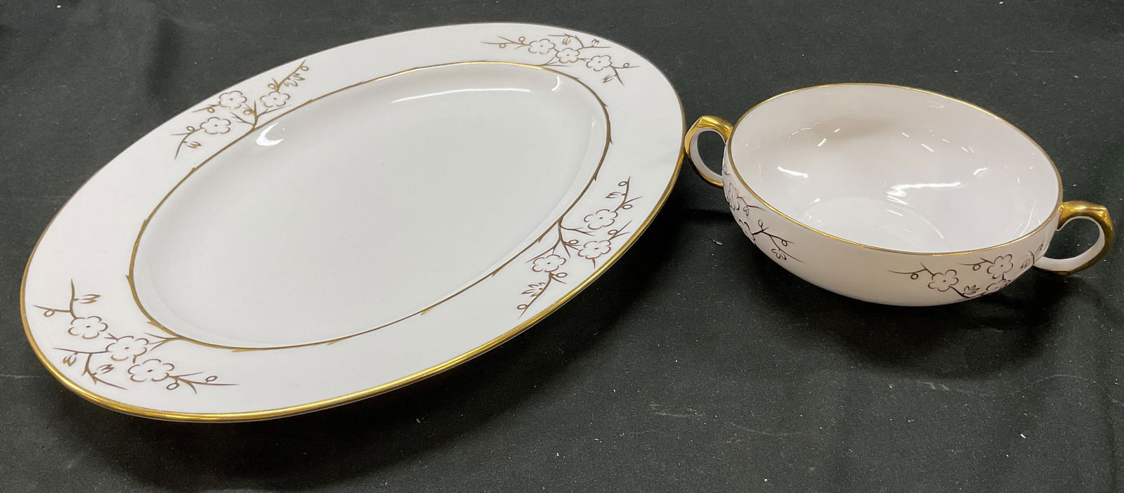 Lot 2 Copeland Spode Bone China Tableware England: Lot of 2 items. Copeland Spode bone china tableware. Includes handled bowl and serving platter. Signed and marked on underside, reads Blanche De Chine Spode Copeland Bone China England. Gilt