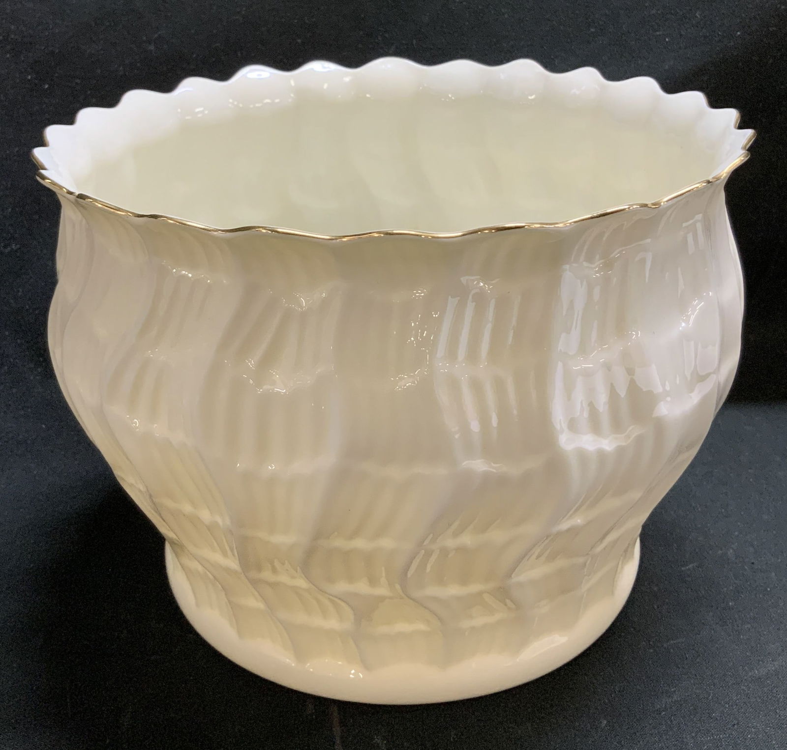 Vtg Belleek Porcelain Vessel IRELAND: Vintage porcelain vessel features a scalloped edge & textured pattern on body. Gilt accents. Glossy finish. Signed & marked on underside. Reads, BELLEEK IRELAND. Surface wear consistent to age, use &