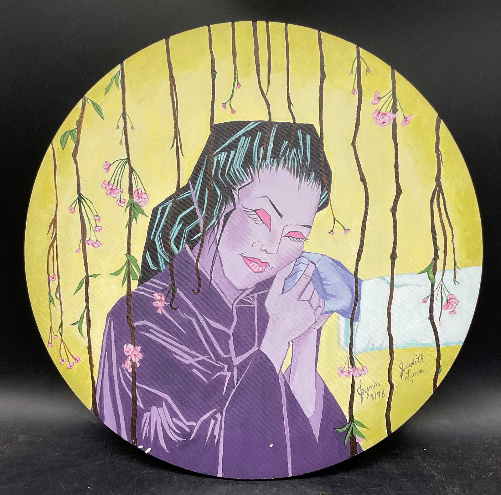 Signed Judith Lynn Woman & Flowers Oil Painting: Oil on canvas painting. Signed lower right, Judith Lynn, 1998. Portrait of a woman with flowers. Measures approx. 16 inches diameter. Some wear consistent with exposure. Art, fine art, home decor, hom