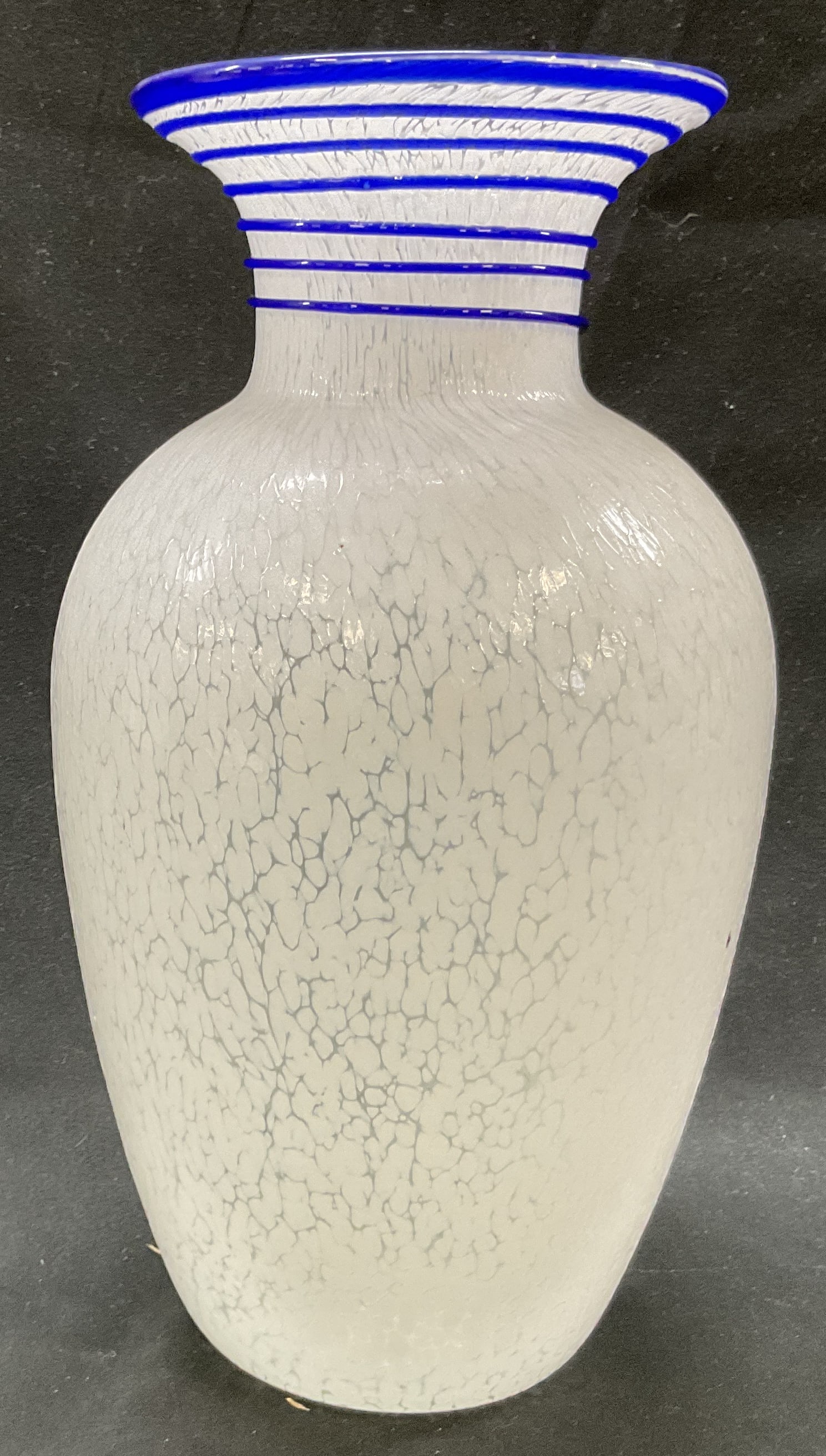 Hand-Blown Blue and White MCM Confetti Vase: Hand-Blown Mid Century Modern Confetti-Style Frosted Glass Vase with blue swirl around neck. Possibly Italian maker. Measures approximately 3.5 x 10 inches. Condition consistent with age.