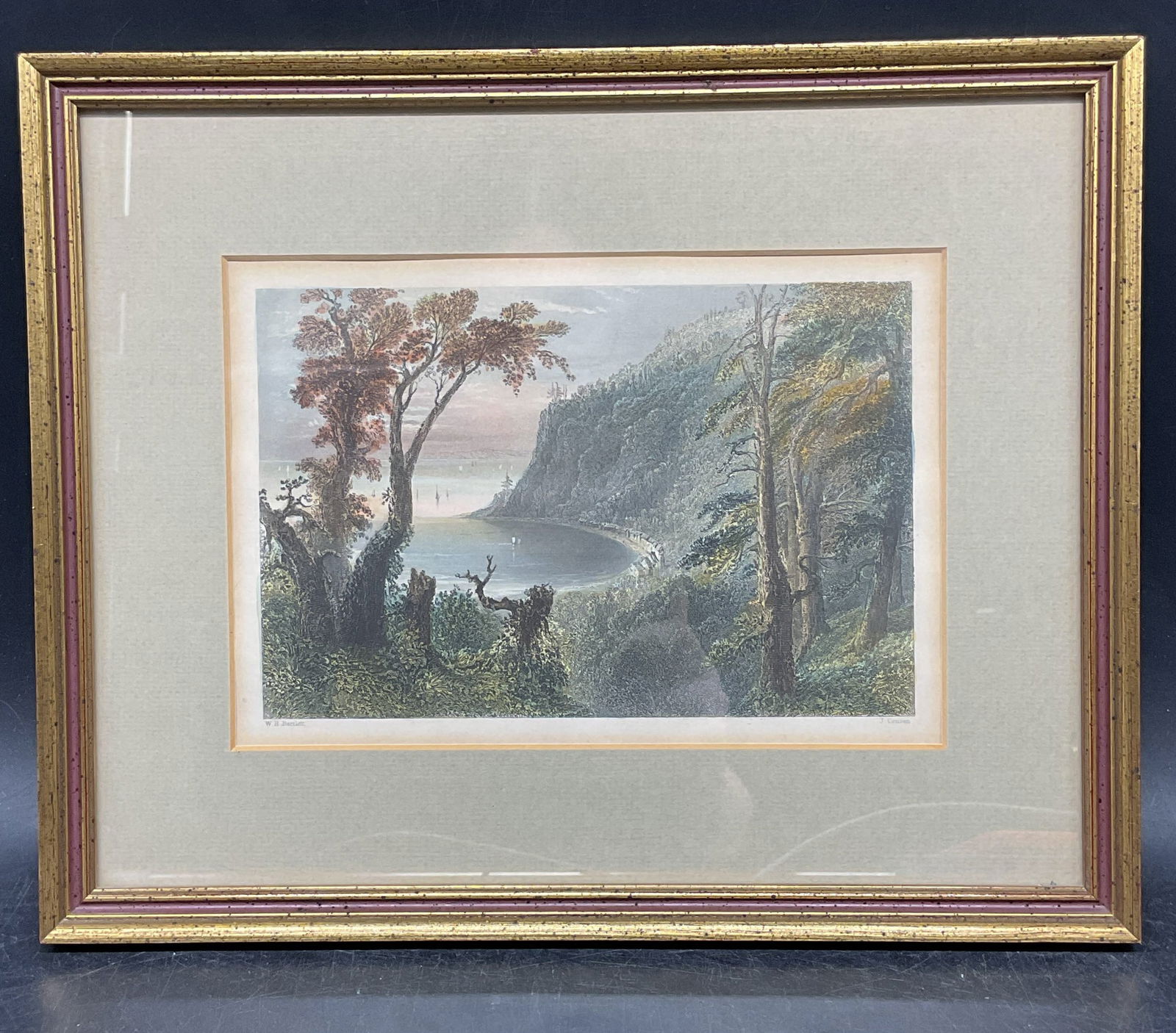 Antique After Bartlett Wolfes Cove Color Engraving: Framed and matted Antique hand colored engraving. After W. H. Bartlett. Engraved by J Cousen. Wolfes Cove. Landscape with water. Gilt wood frame. Not examined out of frame. Frame measures approx.
