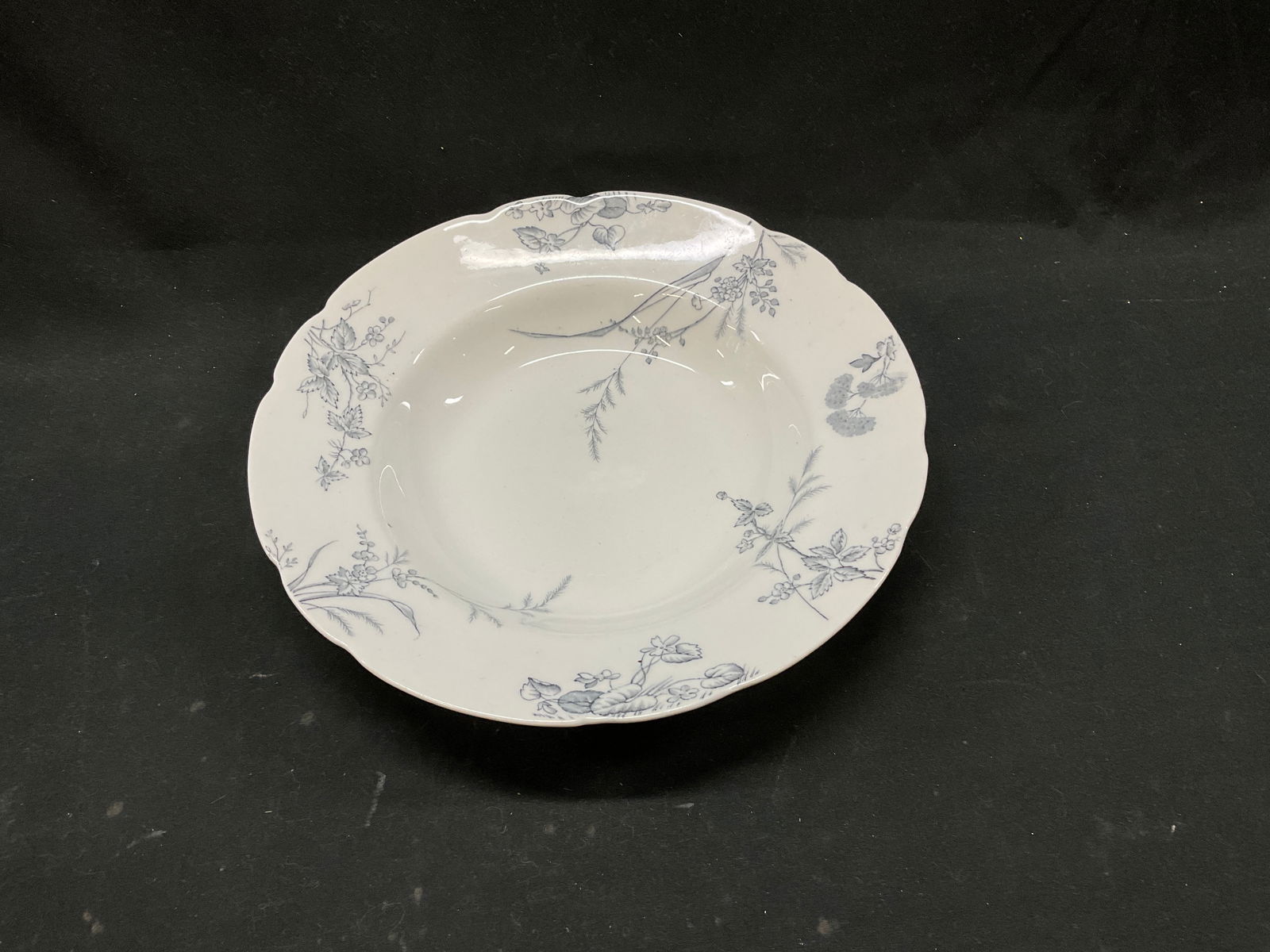 Johnson Brothers Rosedale rimmed Serving Bowl: Johnson Brothers Serving Bowl in their discontinued Rosedale Pattern. Grey wildflowers surround the edges of the plate. England. Possibly vintage. Made of semi-porcelain. Measures approximately 8