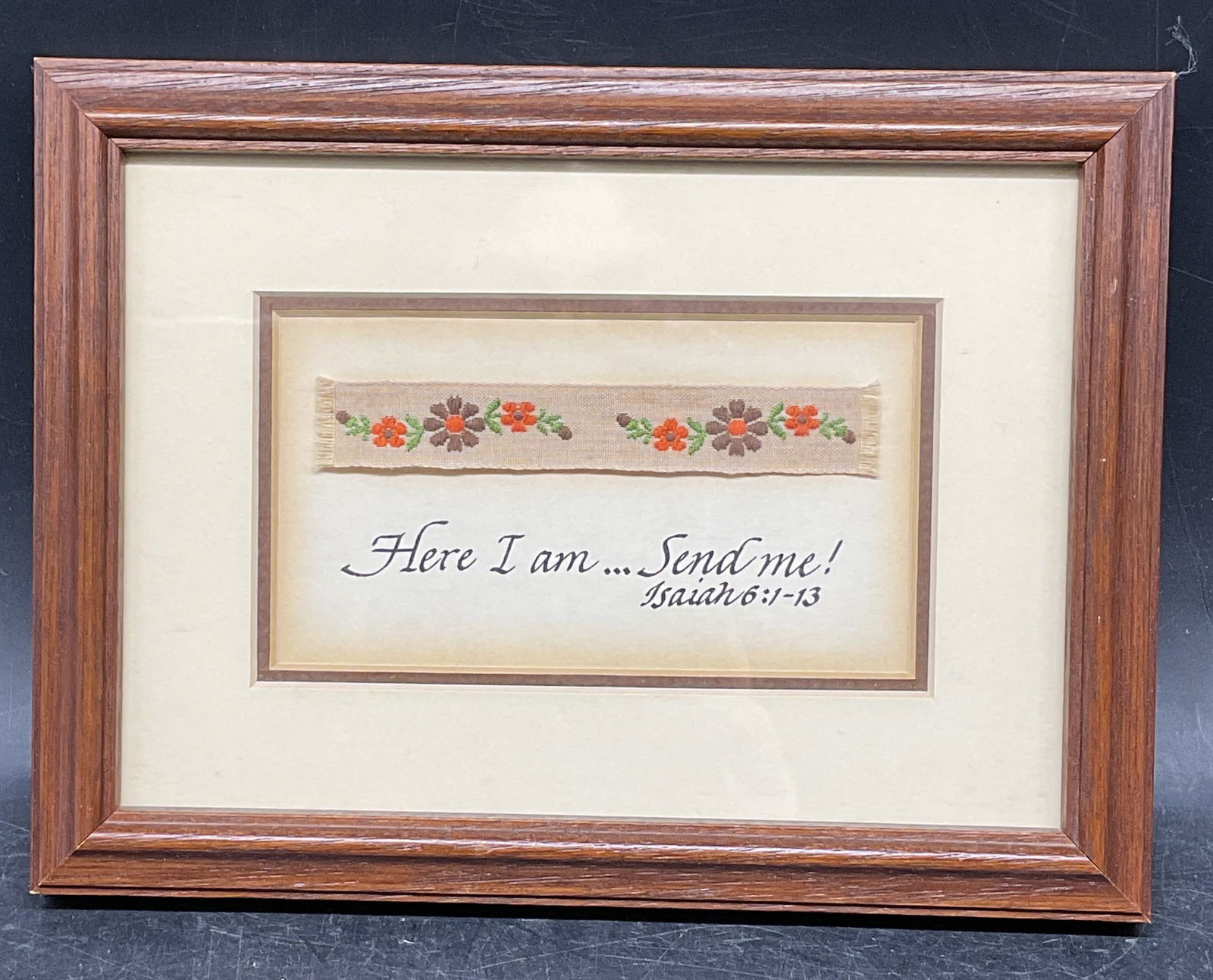 Framed Religious Verse Needlework Embroidery: Framed and matted needlework embroidery textile with floral design and religious verse, Isaiah 6:1-13 Here I am ? Send me! Isidore limited, number 3. Wood frame. Not examined out of frame. Frame measu