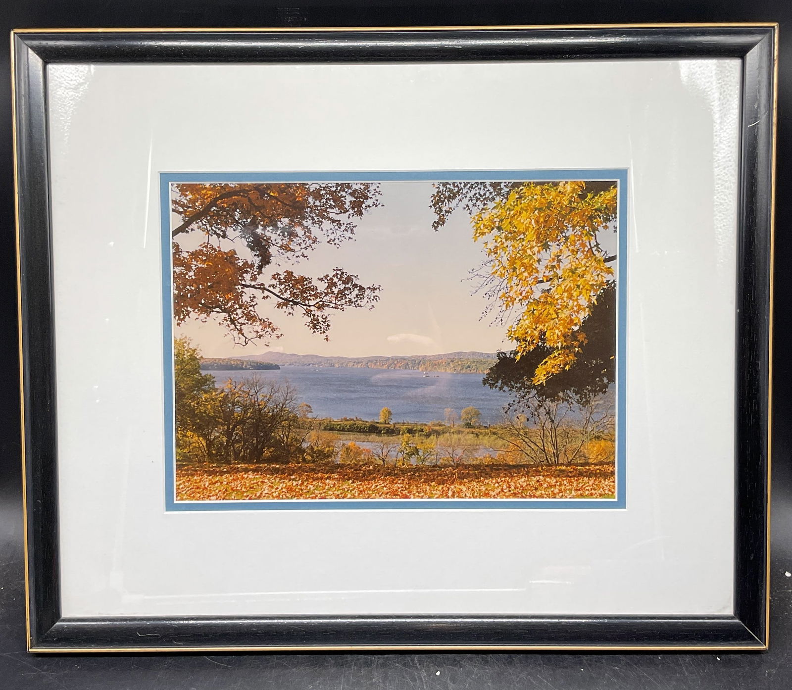 Framed Hudson River Scenery Photograph: Framed and matted photograph. Hudson River scenery with view of river and landscape. Black wood frame. Not examined out of frame. Frame measures approx. 15 x 18 inches. Some wear consistent with