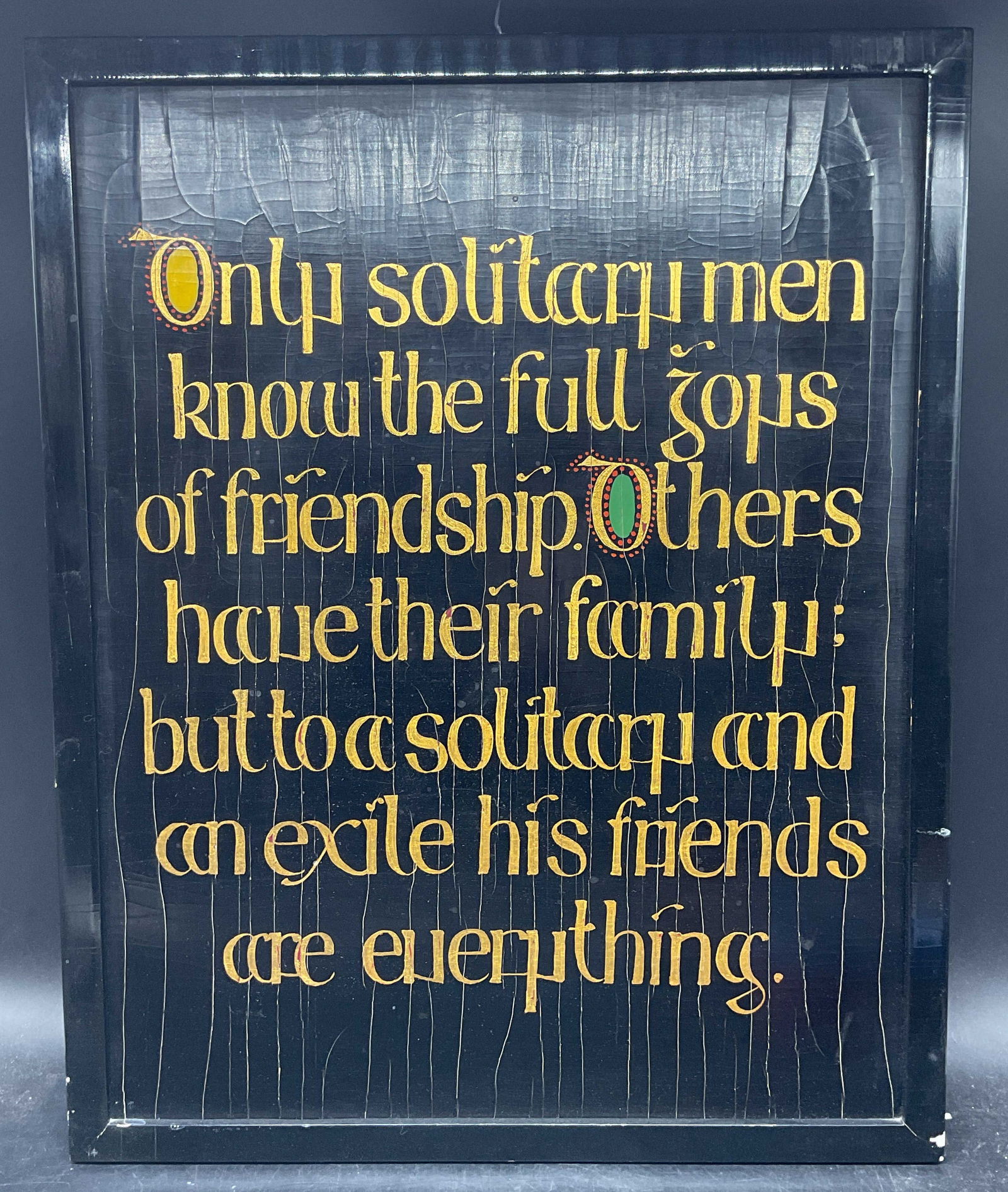 Framed Gilt Wood Friendship Wall Sign: Framed gilt wood wall sign. Inspirational quote. only solitary men know the full joys of friendship. Others have their family; but to a solitary and an exile his friends are everything. Black