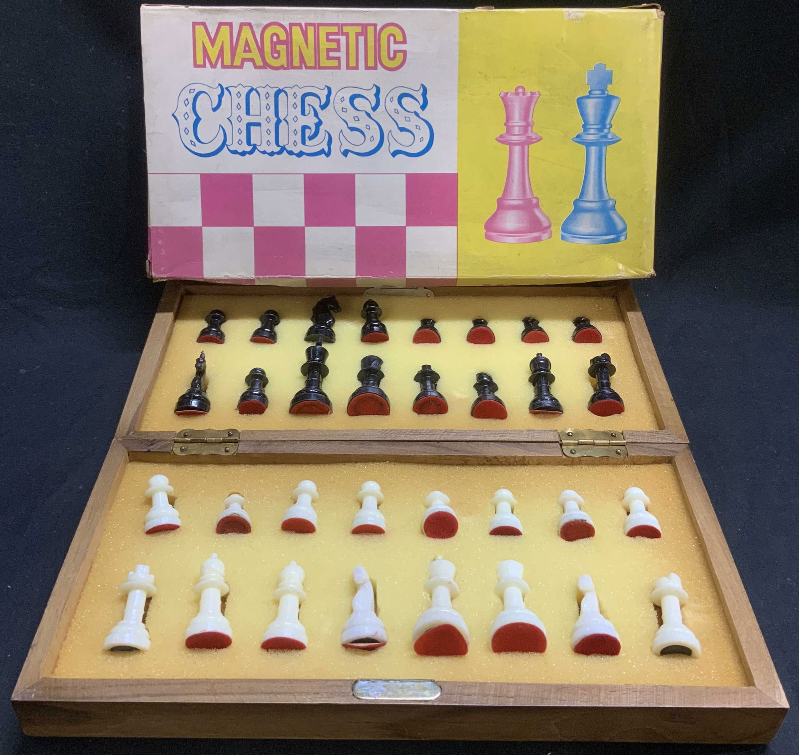 Vtg Magnetic Chess, Board, Pieces & Org Box: Vintage Magnetic chess features black & white chess pieces, foldable cheese board game. Comes with original box. Lot is sold as is. Surface wear consistent to age, use & exposure. Measurements of