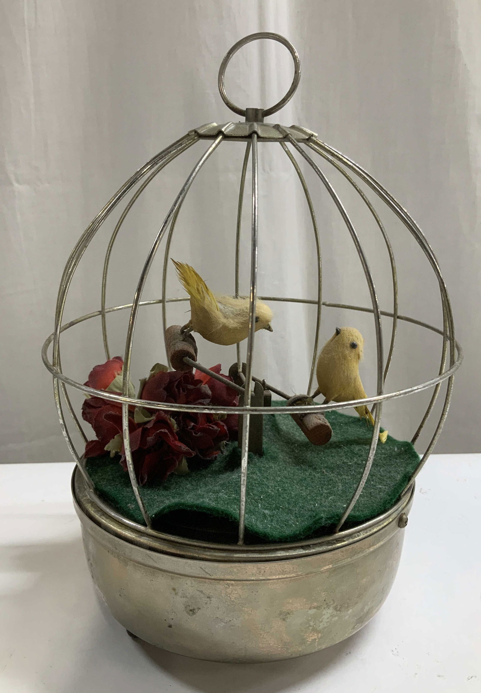 Vtg Schmid Bros. Bird Cage Music Bx JAPAN: Vintage Schmid Bros. musical box features 2 yellow feathered birds inside a silver toned cage. Red flower accents in center. Music box plays, What the World Needs Now is Love. Signed & marked on under