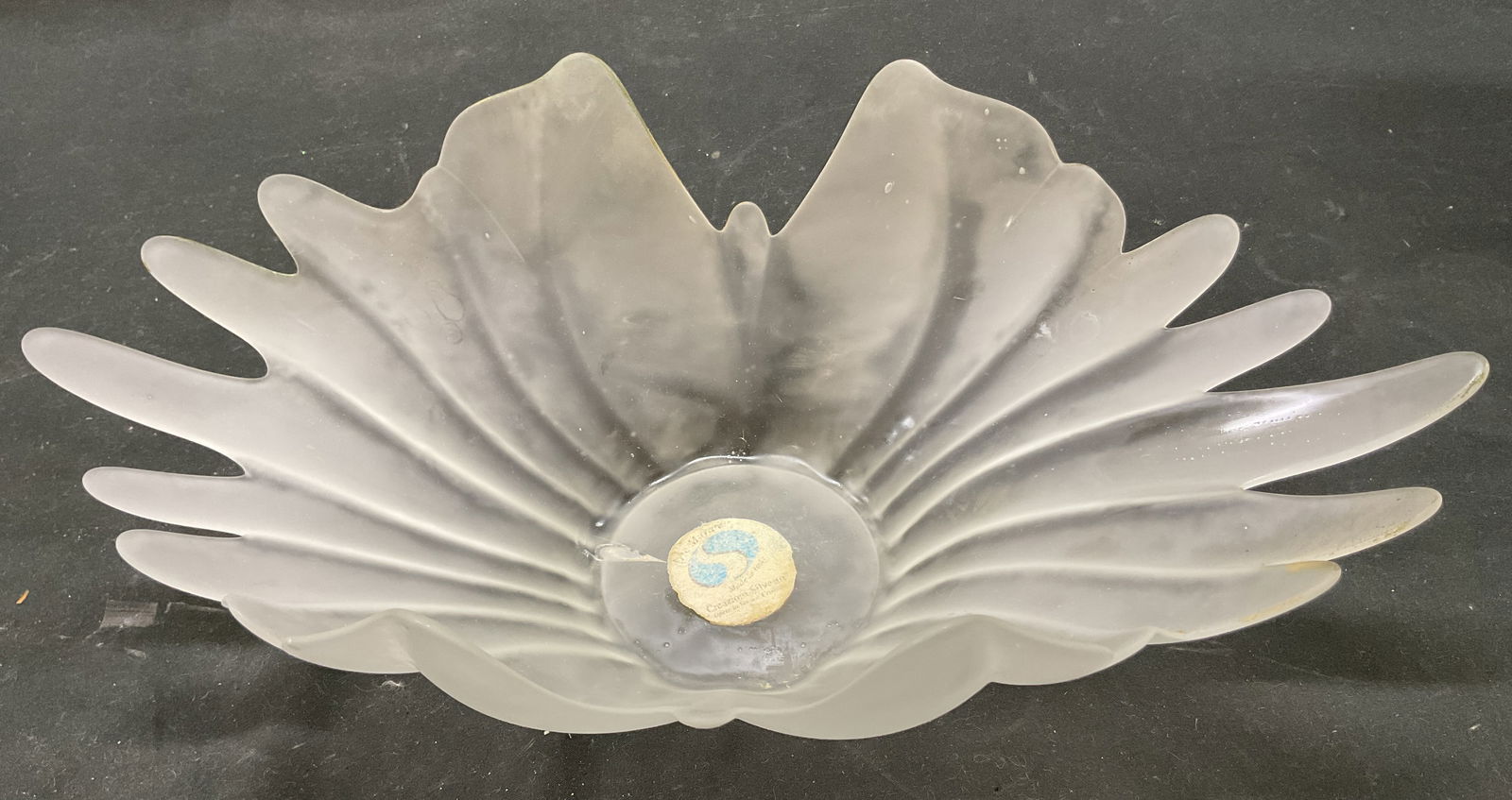 Murano Art Glass Decorative Lotus Bowl Italy: Murano hand blown art glass decorative lotus bowl. Sticker adhered to surface, reads Arte Murano Made In Italy Creazioni Silvestri. Clear art glass. Lotus shaped with varying organic ruffles