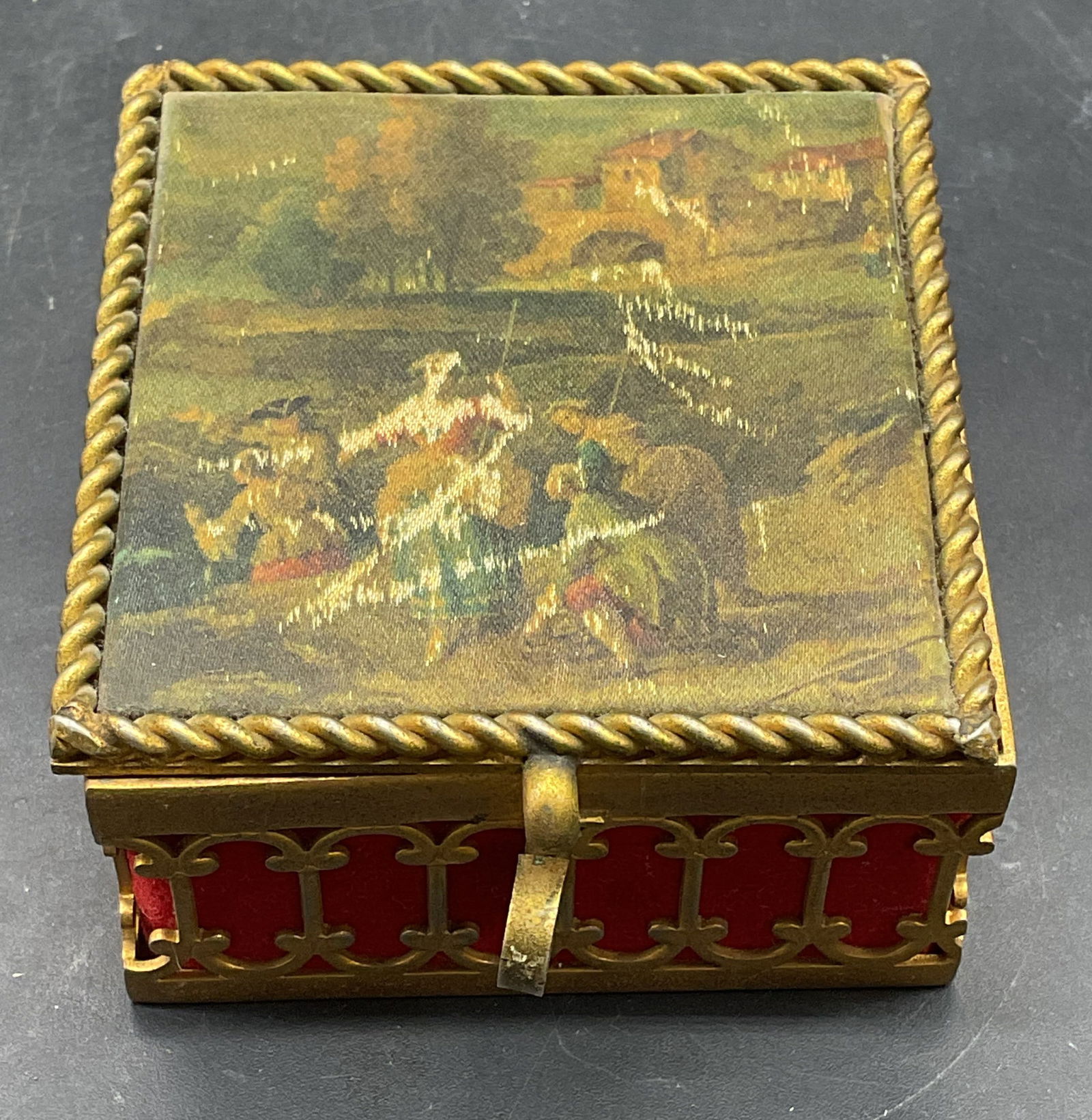 Vtg Cordova Gilt Silk Trinket Jewelry Box, Italy: Vintage Cordova trinket or jewelry box. Reticulated gilt metal frame with red velvet lined box and silk printed lid. Classical figural design on lid. Signed. Made in Italy. Measures approx 2.25 x