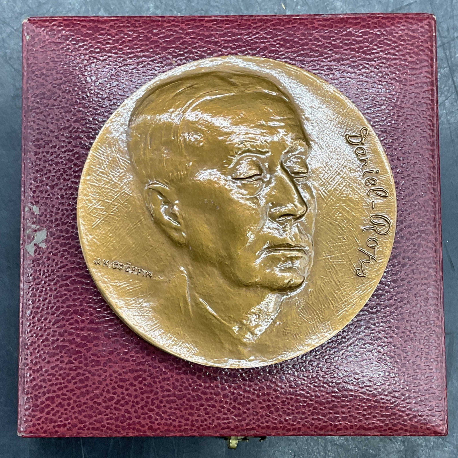 1968 Daniel Rops Bronze Medal, France: Vintage 1968 commemorative bronze medal. Daniel Rops (Henri Petiot). French author. Made in France. Modeled by J. H. Coeffin. Measures approx. 2 5/8 inches wide. includes display case. Some wear consi