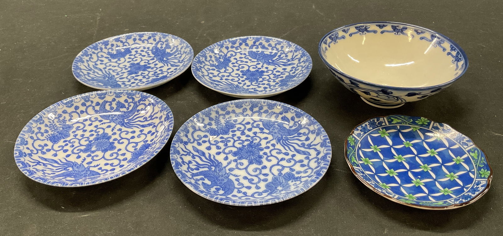 Lot 6 Japanese Porcelain Trinket Dishes Japan: Lot of 6 Japanese porcelain trinket dishes. Some are marked Japan. All are marked with Japanese characters on underside. Scalloped edges. Blue and white floral and bird motifs. Hand painted. Sizes and