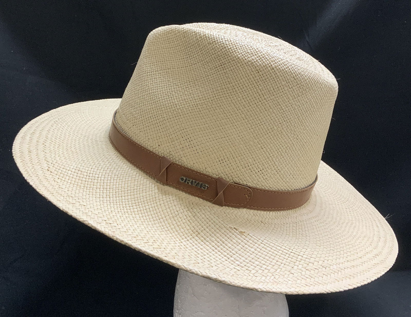 Orvis Hand Woven Genuine Panama Hat ECUADOR: Genuine Panama hat. Hand woven in Ecuador. Size X Large. 7 1/2- 7 5/8. Features a brown leather band with ORVIS accent. Sold as is. Signed & marked. Reads, ORVIS. Surface wear consistent to age, use &