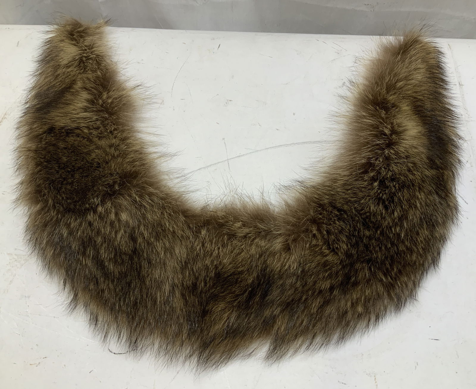 Vintage Brown Fur Collar 21in: Vintage brown collar is brown toned & underside is white toned. Finished with a black trim. No visible signature or markings. Surface wear consistent to age, use & exposure. Measurements: length