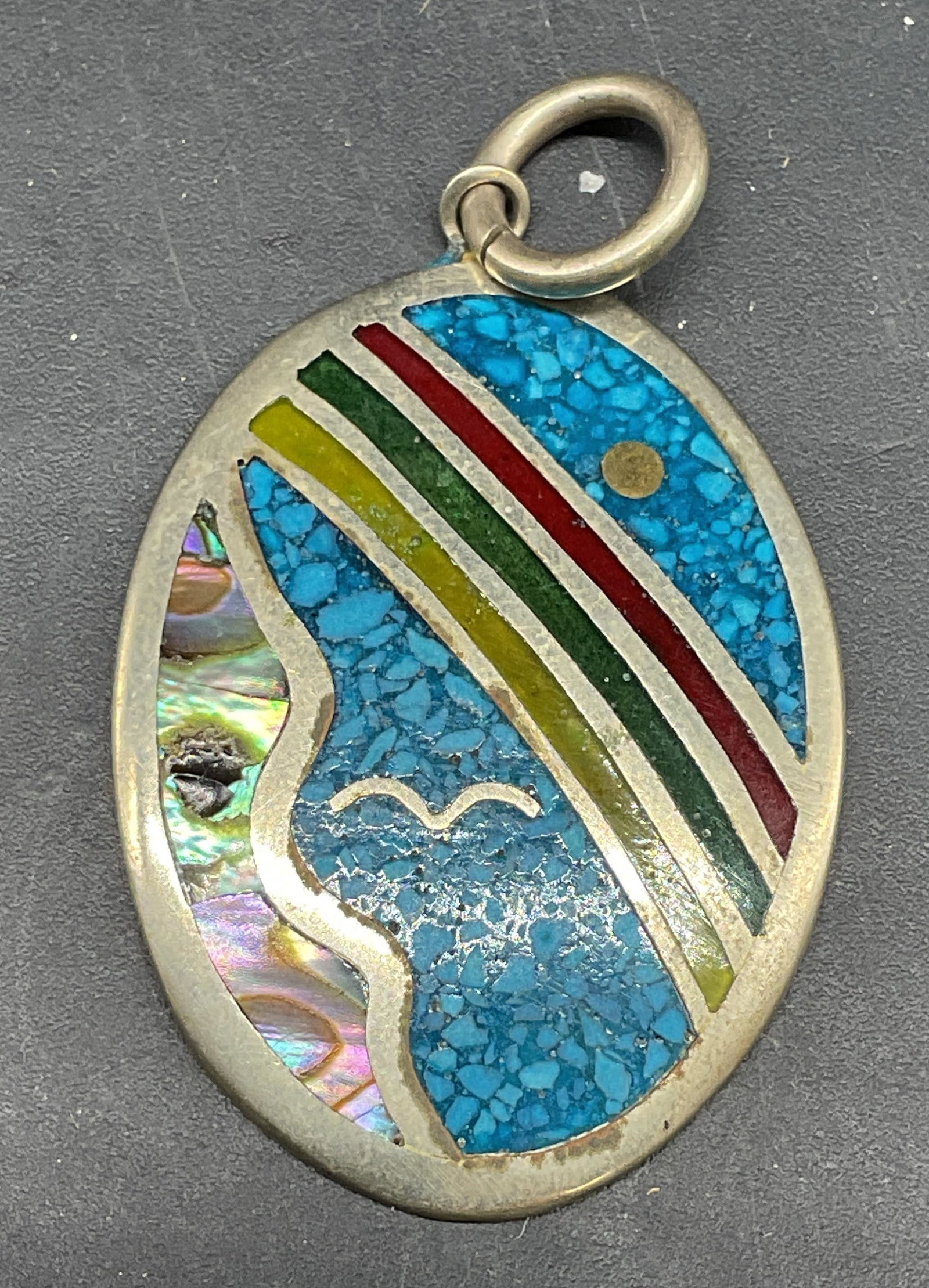 Vintage Silver Tn Alpaca Abalone Pendant: Vintage signed Alpaca silver tone abalone and stone inlaid pendant. Measures approx. 1 3/8 x 1 inches. Some scratching. Jewelry, estate jewelry, costume jewelry, cocktail jewelry, fashion jewelry, acc