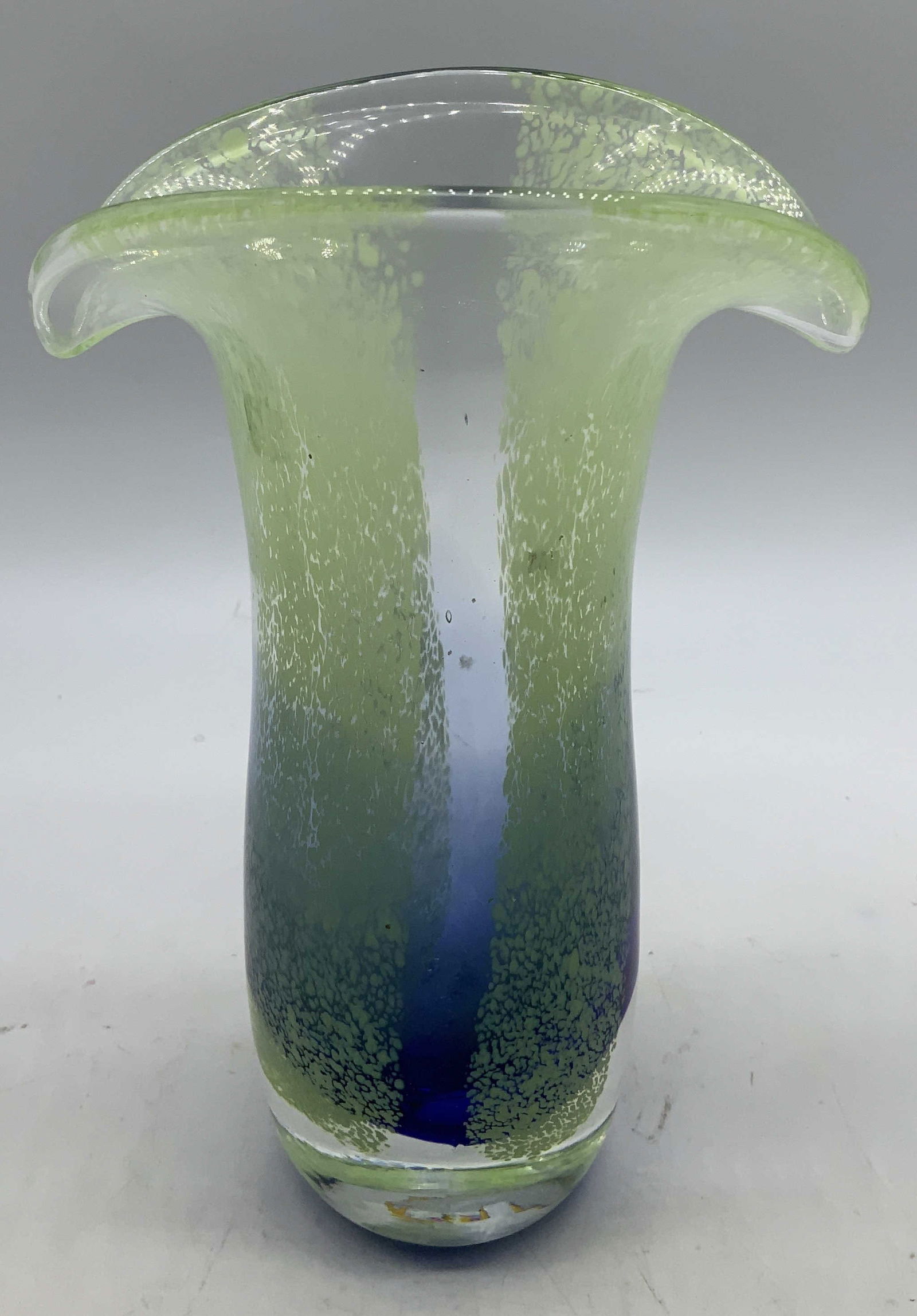 Vtg Teleflora Hand Blown Art Glass Vase: Vintage Teleflora art glass vase features a distinctive blue and lime green speckled design. Features a flared, Jack in the Pulpit style rim. Signed & marked on underside. Reads, TELEFLORA GIFT. Surfa