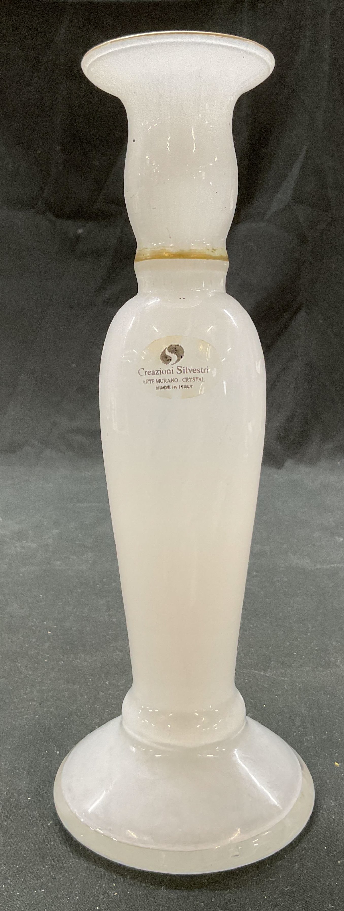 Murano Creazioni Silvestri Crystal Bud Vase Italy: Murano Creazioni Silvestri white hand blown crystal bud vase. Sticker adhered to surface, reads Creazioni Silvestri Arte Murano Crystal Made In Italy. Tall design with flared mouth, slender neck, bulb