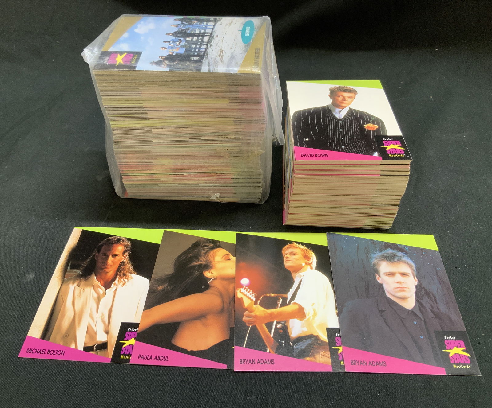 Lot 50+ 1991 ProSet Super Stars MusiCards: Lot includes, 50+ ProSet Super Stars MusiCards. Copyright 1991. Cards have not been inspected individually. Lot is sold as is. Surface wear consistent to age, use & exposure. Measurements: length