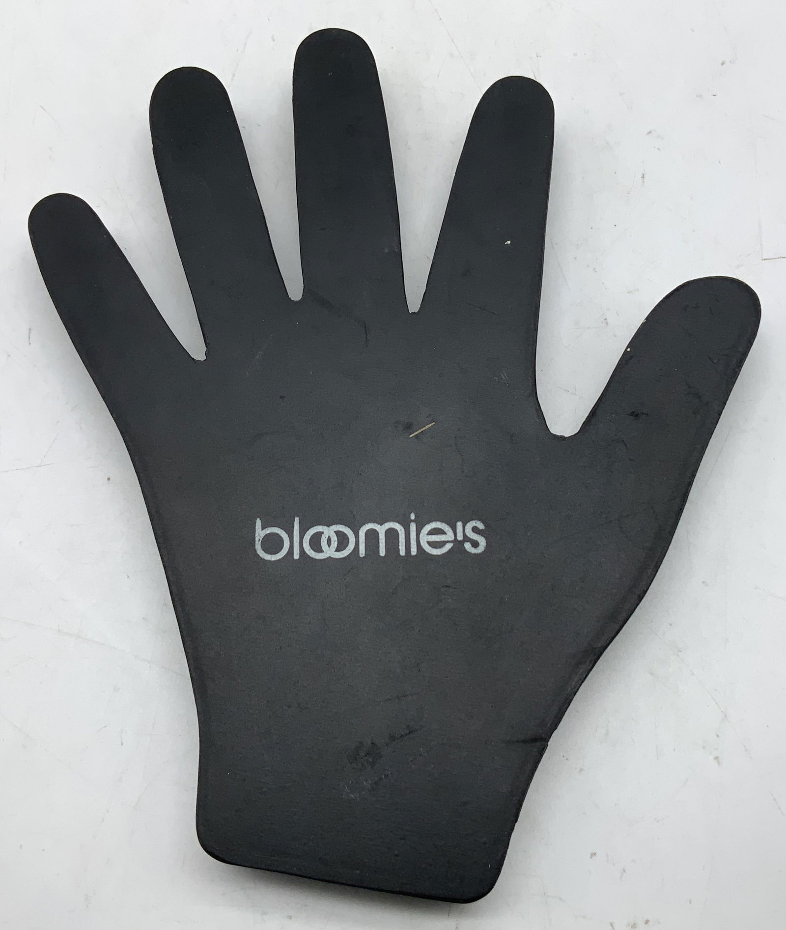 1986 Canetti Bloomies Hands Off Paperweight: 1986 Canetti Hands Off My Papers hand-shaped paperweight. Black toned. Appears to be rubber material. Signed & marked. Reads, BLOOMIES HANDS OFF MY PAPERS 1986 CANETTI. Surface wear consistent to