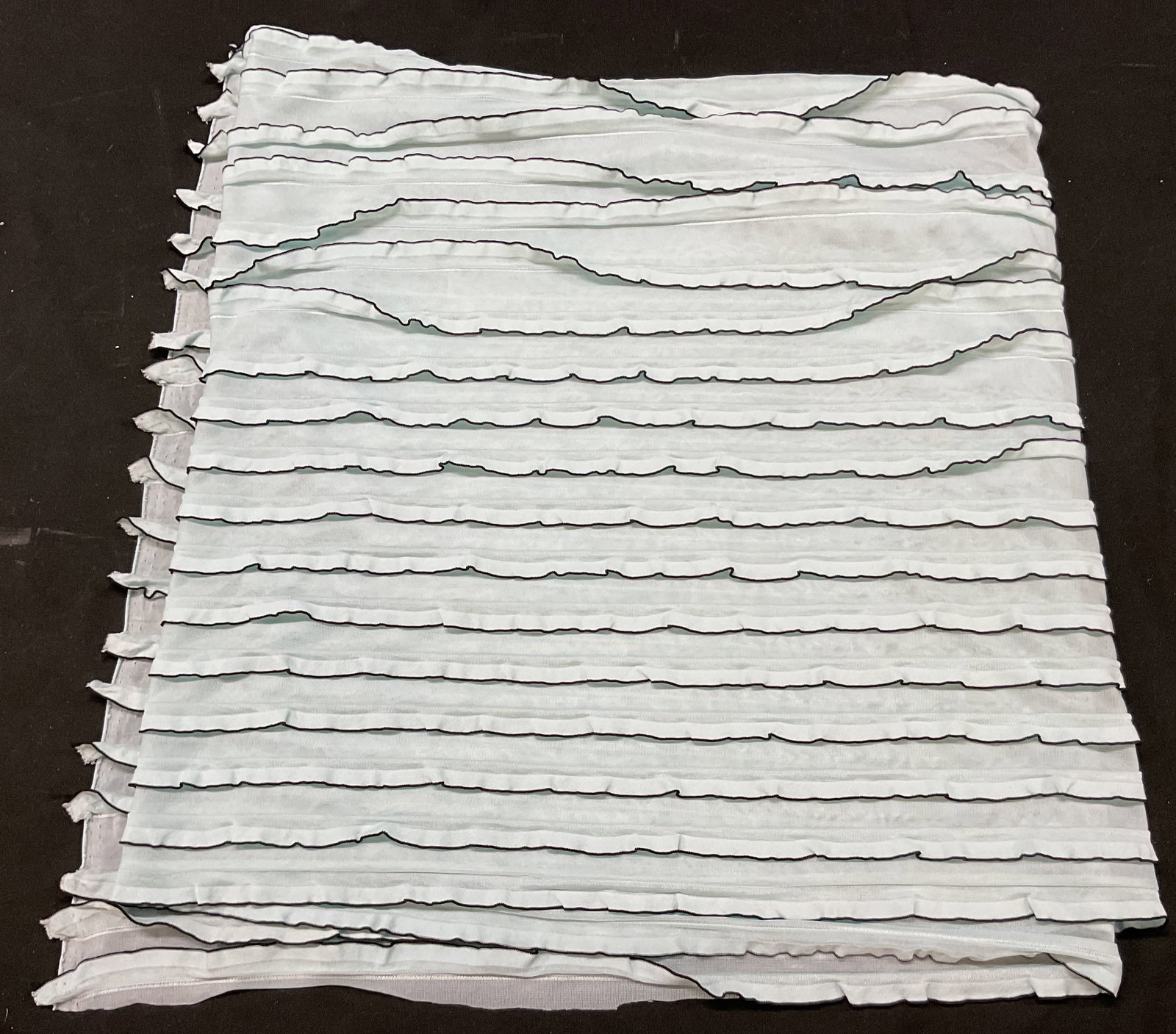 Torino Teal Ruffled Scarf: Torino teal ruffled scarf. Feels like cotton. Teal and blue. Ruffled trim pattern with scalloped edges. Measures approx 14 x 57 inches. Wear consistent with exposure. Scarf, Torino, wearables, clothin