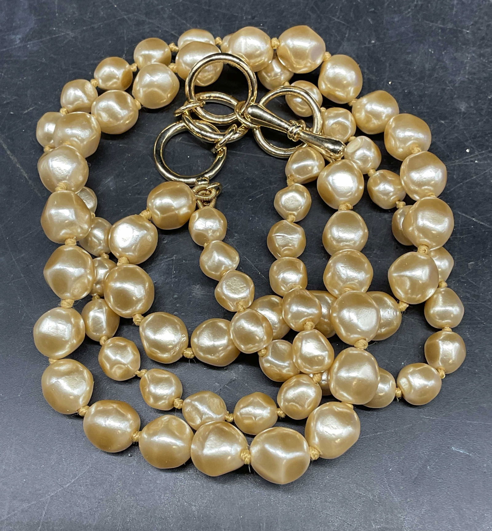 Monet Double Strand Faux Pearl Necklace: Vintage signed Monet double strand faux pearl necklace. Drop length approx 8 inches. Some scratching. Jewelry, estate jewelry, costume jewelry, cocktail jewelry, fashion jewelry, accessories, fashion
