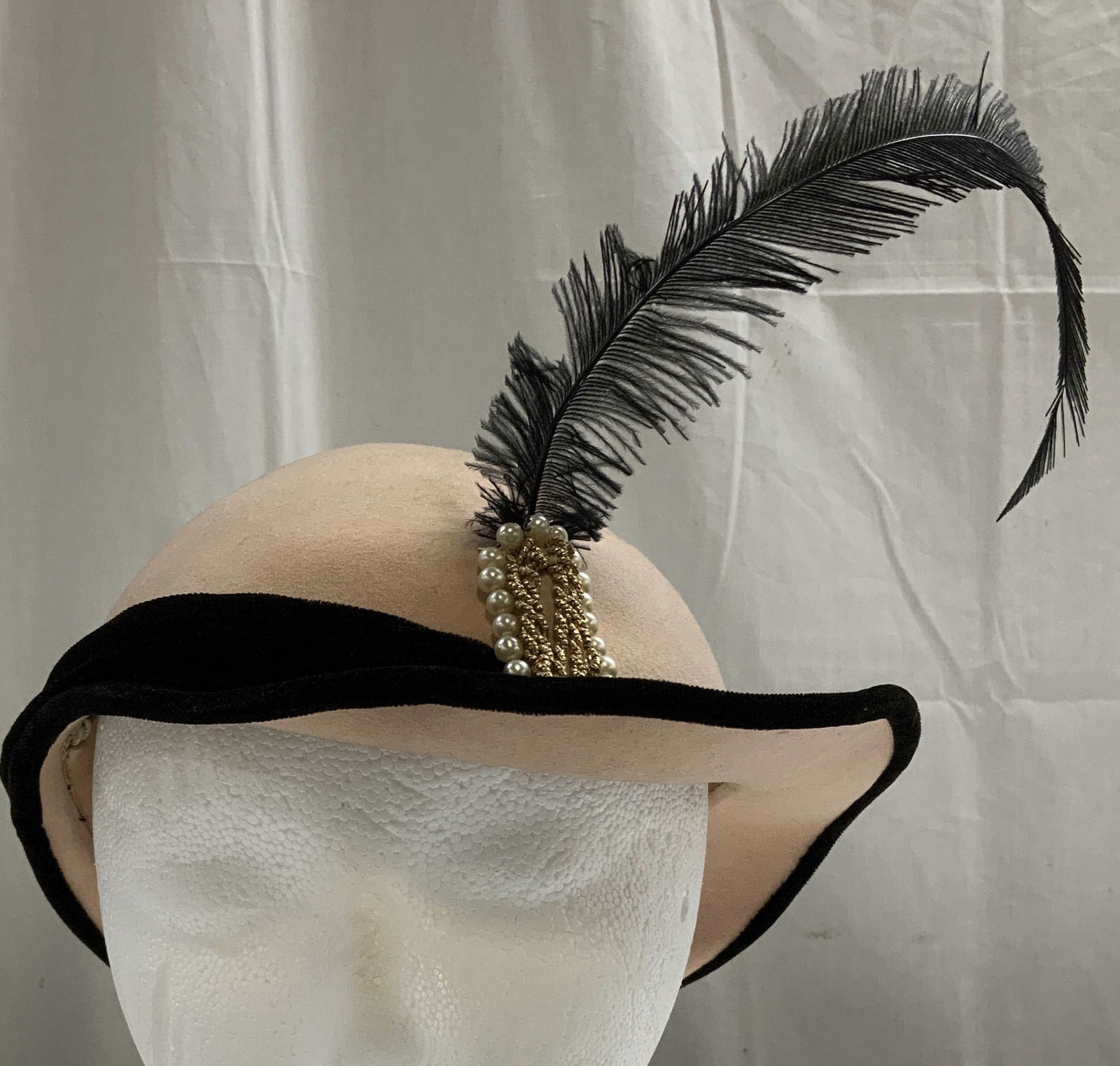 Vtg Colby Merrimac Hat Corp. Excello Wool Hat: 100% wool material. Hat is pink & features a black brim. Feather & faux pearl accents. Signed & marked on underside. Reads, MERRIMAC HAT CORP. EXCELLO. COLBY. Surface wear consistent to age, use & exp