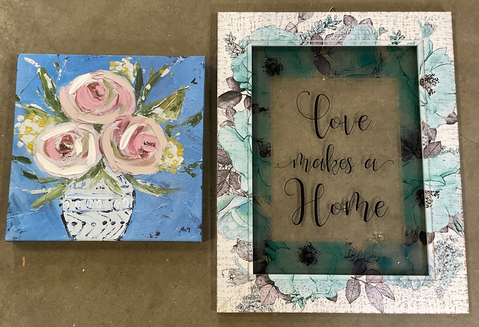 Lot 2 Flowers Embellished Canvas, Love Home: Lot of 2 home wall signs and embellished canvas print. Floral still life embellished canvas print. Love makes a home framed glass wall sign. Larger measures approx. 19.5 x 15.5 inches. Some wear