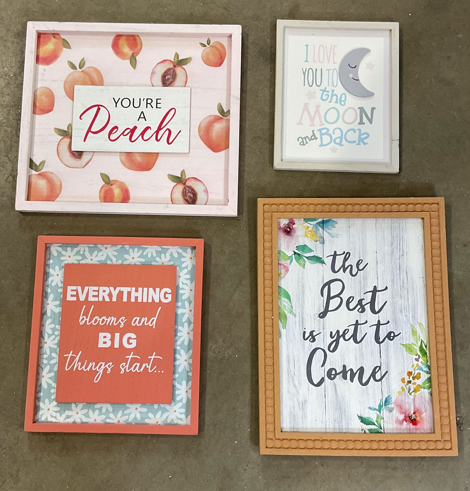 Lot 4 Framed Wood Home Wall Signs: Lot of 4 framed wood home wall signs. Everything Blooms, Youre a Peach, Love You, and Best Yet To Come motifs. Largest measures approx. 14.25 x 12.75 inches. Wear including marks and scratching. Art,