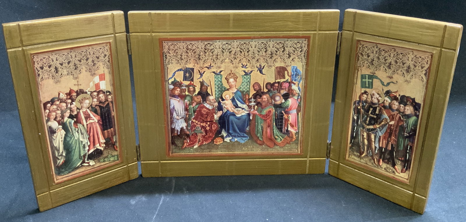 Vtg Gilt Triptych Icon, Adoration of the Magi: Gilt Triptych Icon, depicting the Adoration of the Magi, after a 15th-century painting by Stefan Lochner. Features 3 hinged panels. Shades of green, blue, red, brown, white, etc. No visible signature