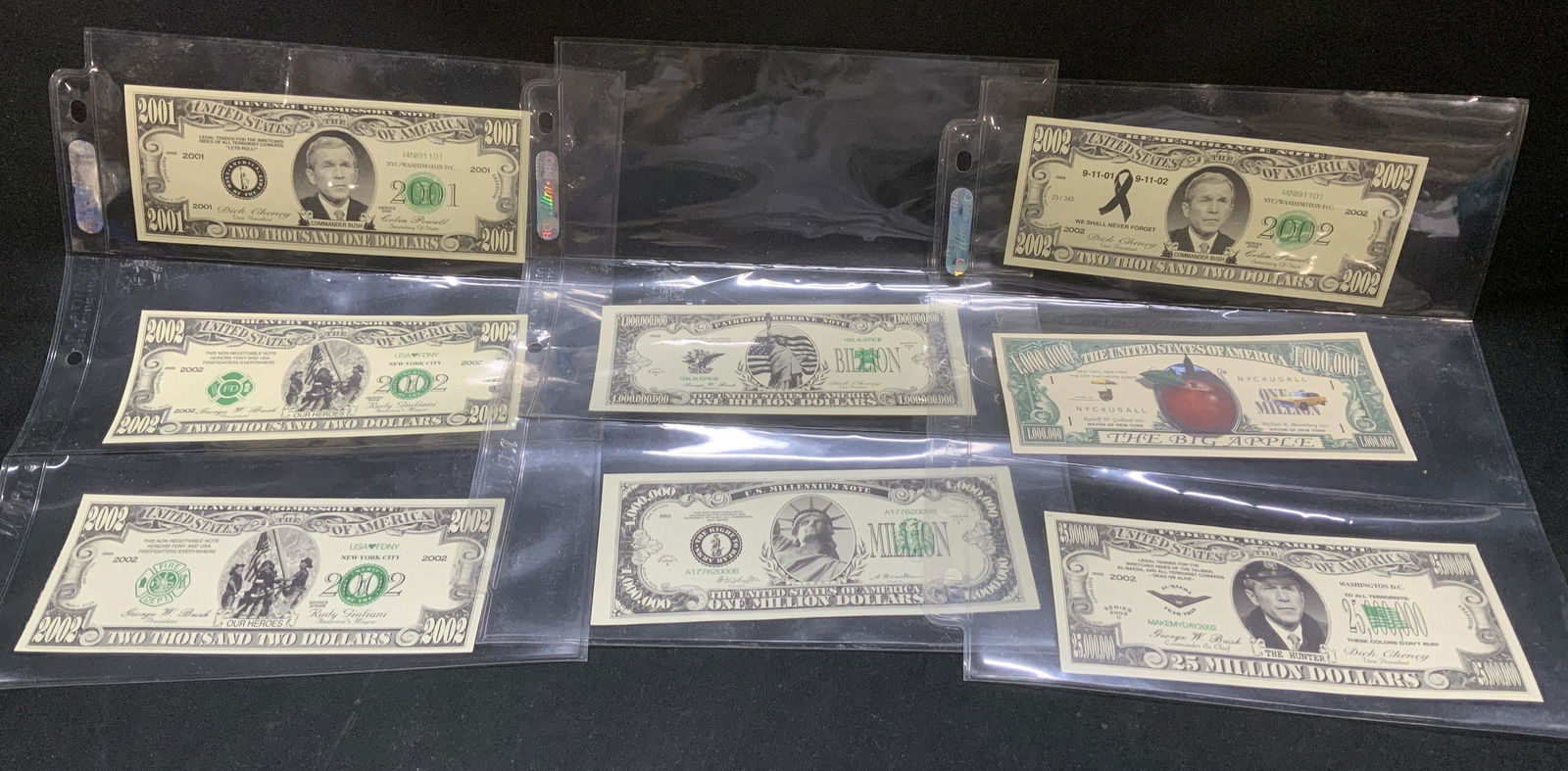 Lot 8 1999 & 2002 A.Ross Novelty Bills: Lot includes, 8 novelty bills honoring the firefighters of the FDNY & the USA, Commander Bush, The Hunter, The Big Apple & Statue of Liberty. Reads, Two Thousand Dollars, One Billion Dollars, 25 milli